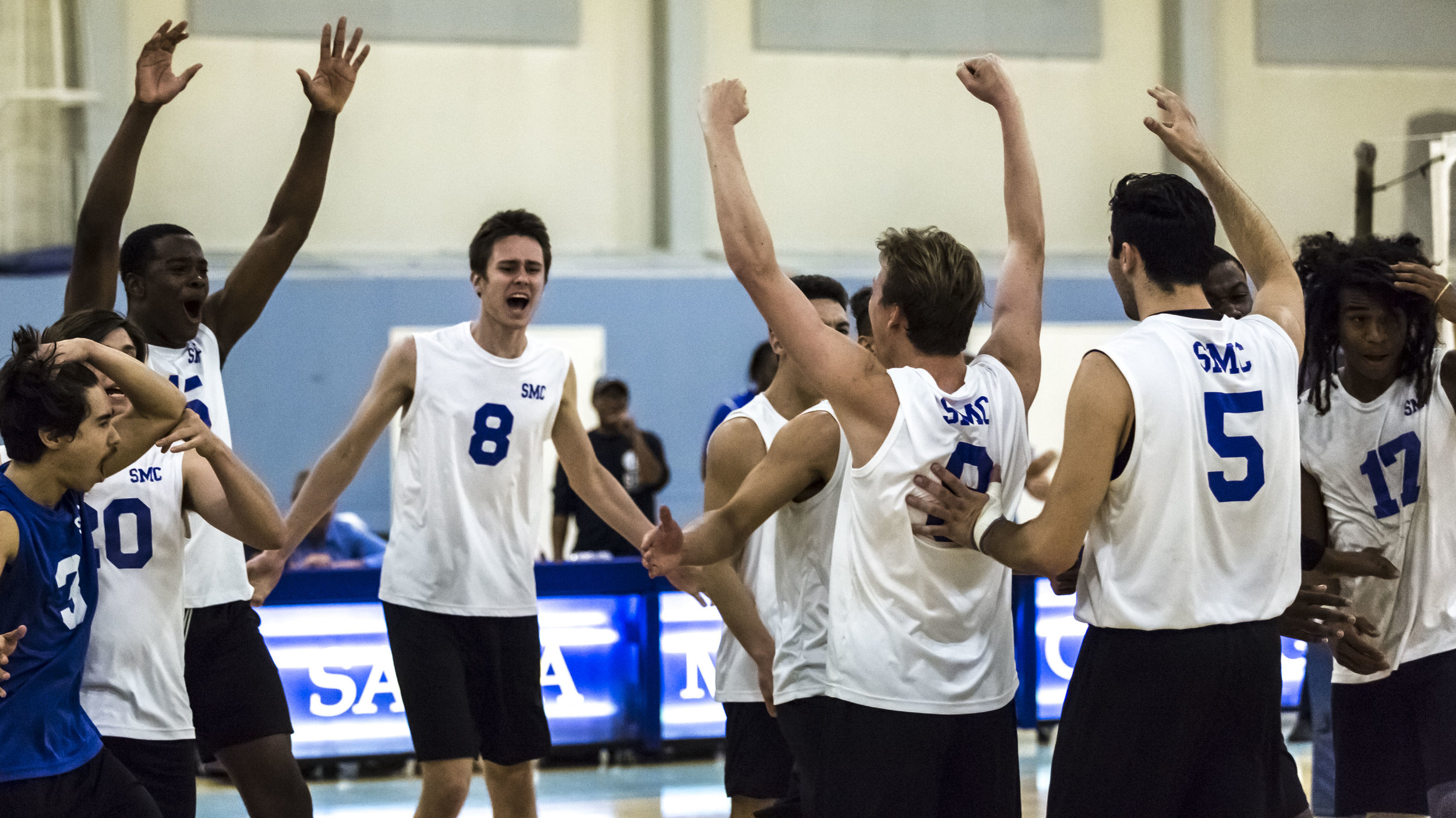  The Santa Monica Corsairs celebrates their match winning point (3-2) against The Pierce College Brahmas in the Santa Monica College gymnasium in Santa Monica Calif., on Friday, April 21 2017. The Corsairs however would go on to win the game 3-2, whi