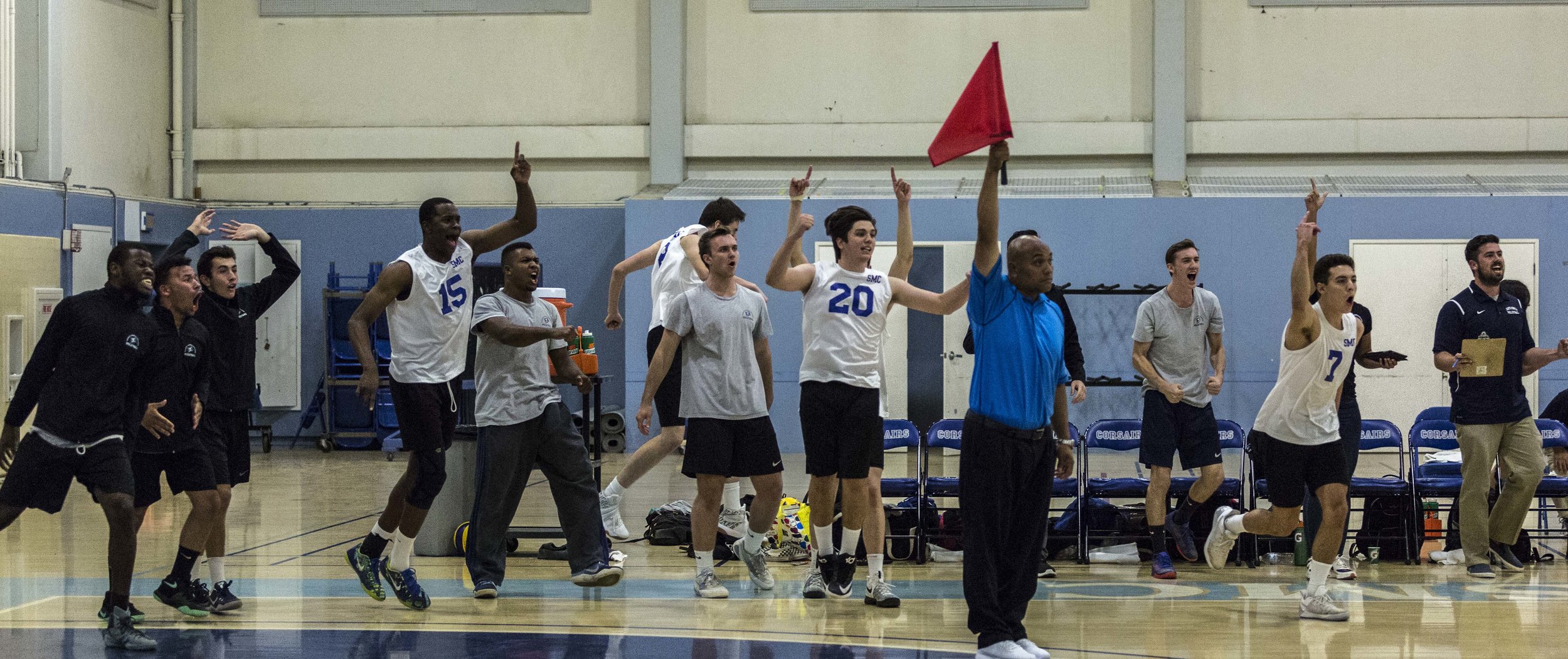  The Santa Monica Corsairs bench celebrates their match winning point (3-2) against The Pierce College Brahmas in the Santa Monica College gymnasium in Santa Monica Calif., on Friday, April 21 2017. The Corsairs however would go on to win the game 3-