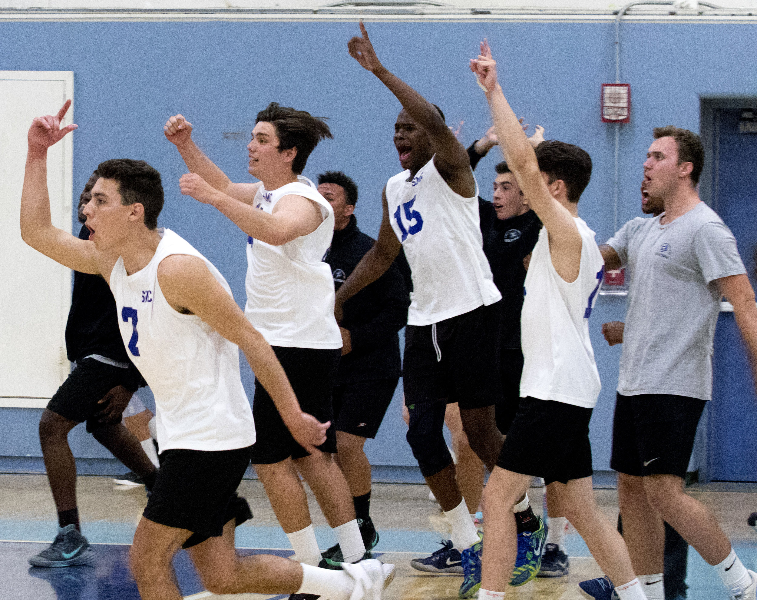  The Santa Monica College Corsairs bench rushes the court in celebration as the Corsairs win the match 3-2 against Pierce College Brahmas on April 21, 2017 at the Santa Monica Gymnasium at Santa Monica College in Santa Monica California (Photo By: Za