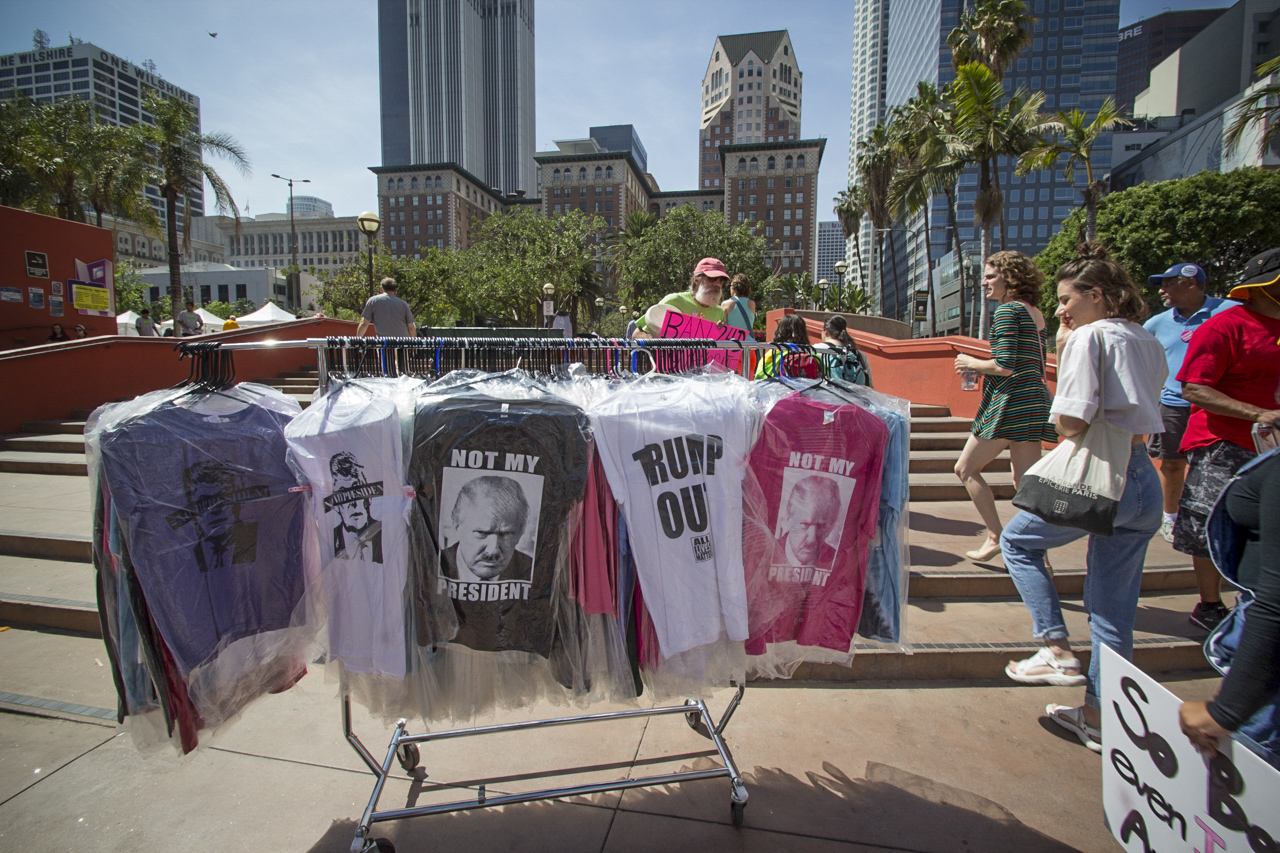  Somone's unattended clothing rack of anti-trump shirts at the March for Science rally on Earth Day in Downtown Los Angeles, April 22, 2017. (Jazz Shademan) 