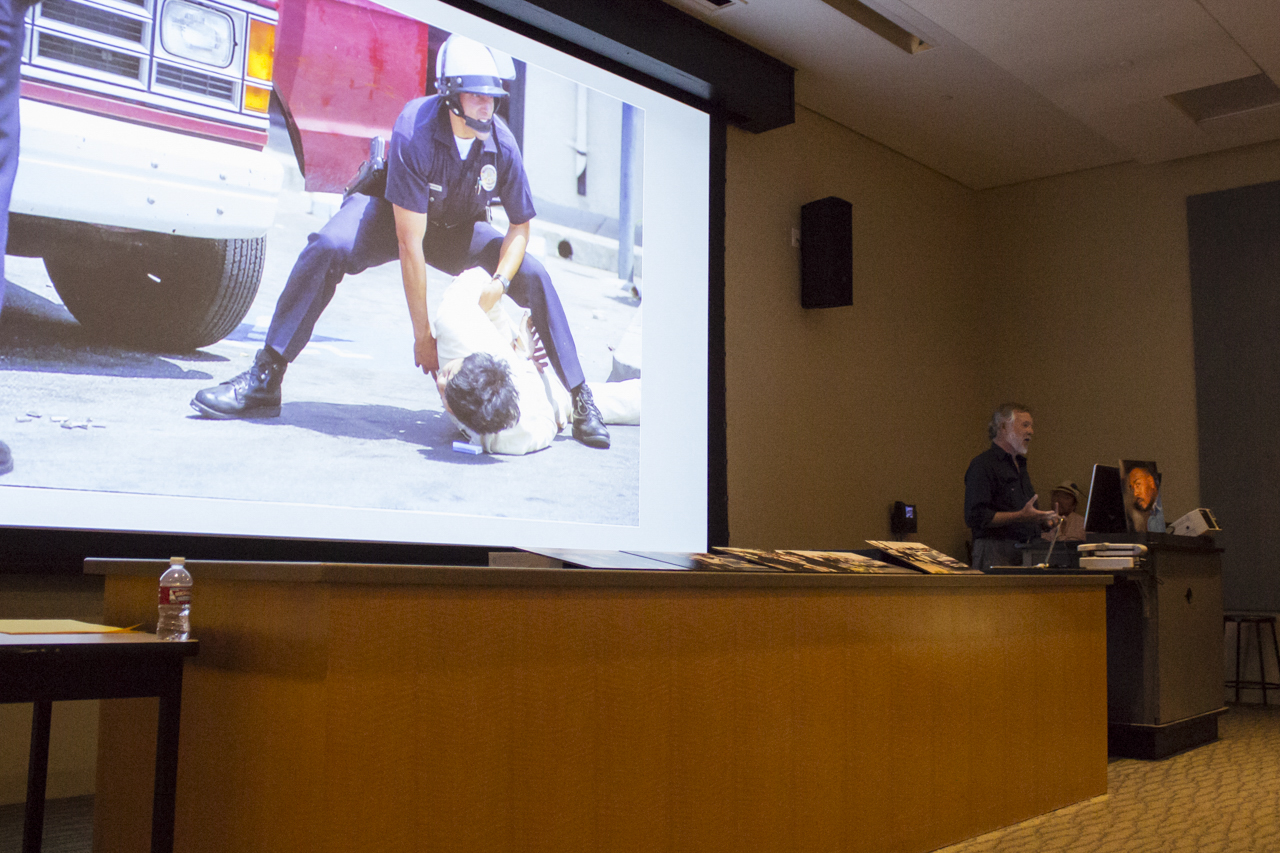  Professor Gerard Burkhart, shares his experience and photography from the Los Angeles riots 25 years ago. The Communication & Media Lecture Series was held at Santa Monica College, April 27, 2017. (Jazz Shademan) 