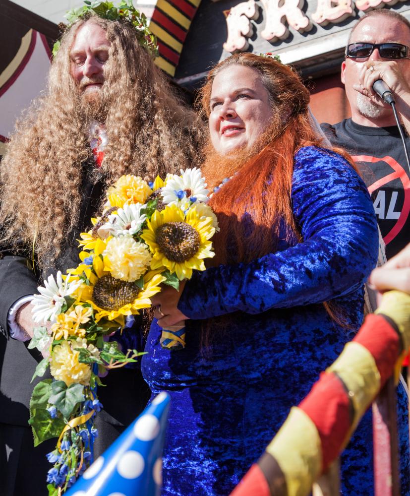  Craig Burlingame, left, and Jessa The Bearded Lady, center, face the crowd after getting married on the front steps of The Venice Beach Freakshow, by Todd Ray, right, owner of the Freakshow on Sunday, April 30, 2017 in the Venice Neighborhood of Los