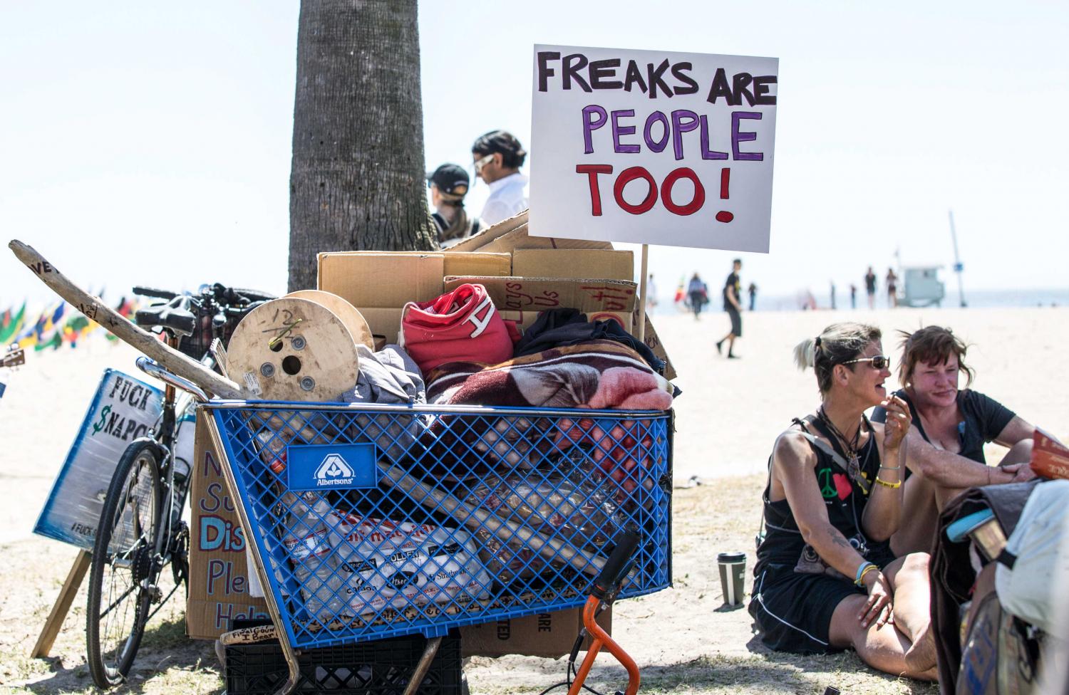     Venice Freakshow performer Morgue performs a mind bending feat in which he shoves a meat hook through his nose and out of his mouth without any harm being done for himself at the Venice Beach Freakshow Farewell Party and Protest in Venice Califor