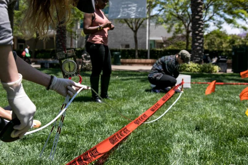 Students from the Forensic Anthropology Class at Santa Monica College stage a mock crime scene on campus on Saturday May 21. 2016 in Santa Monica, Calif. (Christian Monterrosa)