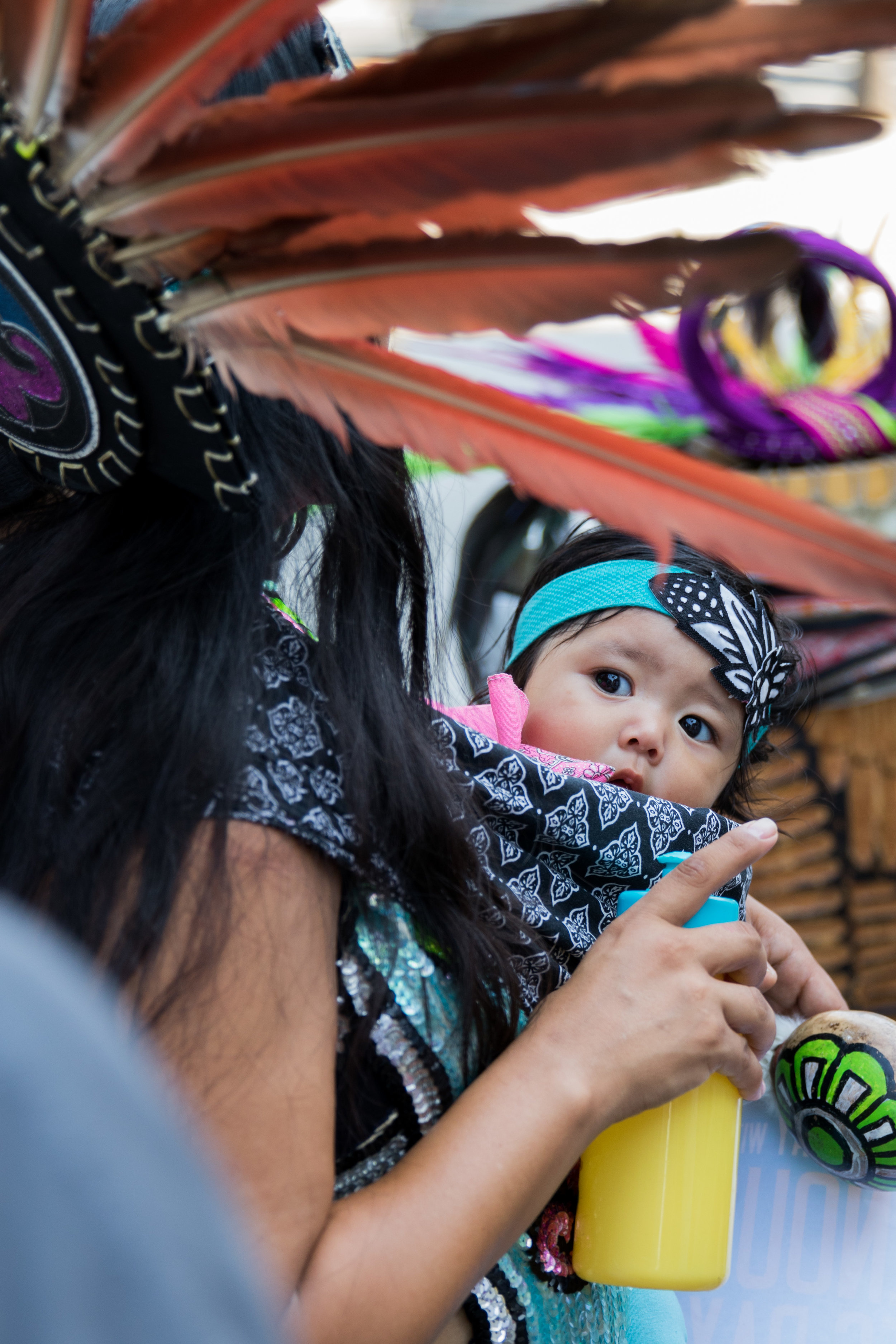  Lilia Herrera (left) takes a break to feed her daughter Xochipilli Herrera (right) at Los Angeles City Hall for the replacement of Columbus Day with Indigenous Peoples Day which was successful on August 30, 2017 in Los Angeles, California (Photo By: