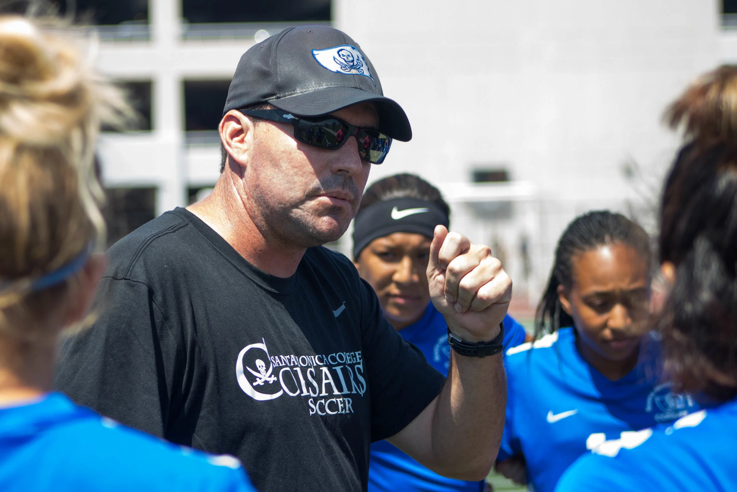  Coach Aaron Benditson giving his team a pep talk before their soccer game at Santa Monica College Field in Santa Monica, California against the MiraCosta Spartans on Wednesday, September 6th, 2017. The Corsair went on to win the game 1-0. (Photo by: