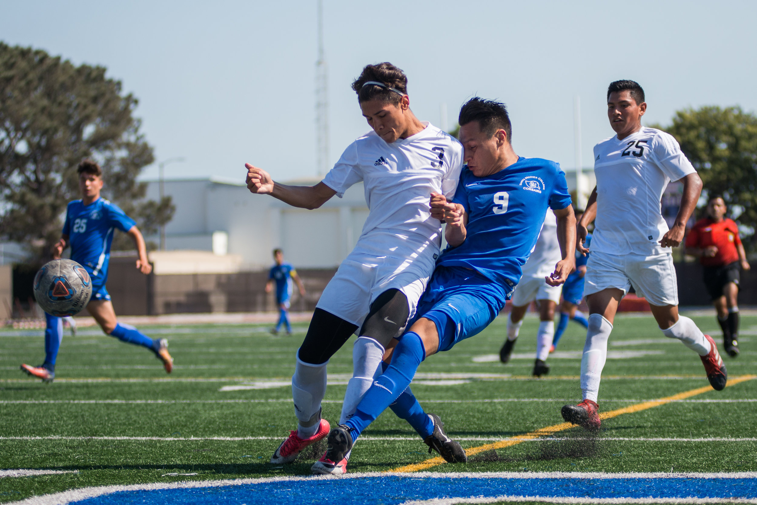  Santa Monica College Corsair Chris Negrete (9) (CTR) contests a pass against Citrus College Owl Jayson Yepez Chavez (3) (L) on Tuesday September 26, 2017 on the Corsair Field at Santa Monica College in Santa Monica, California. The Corsairs tied the