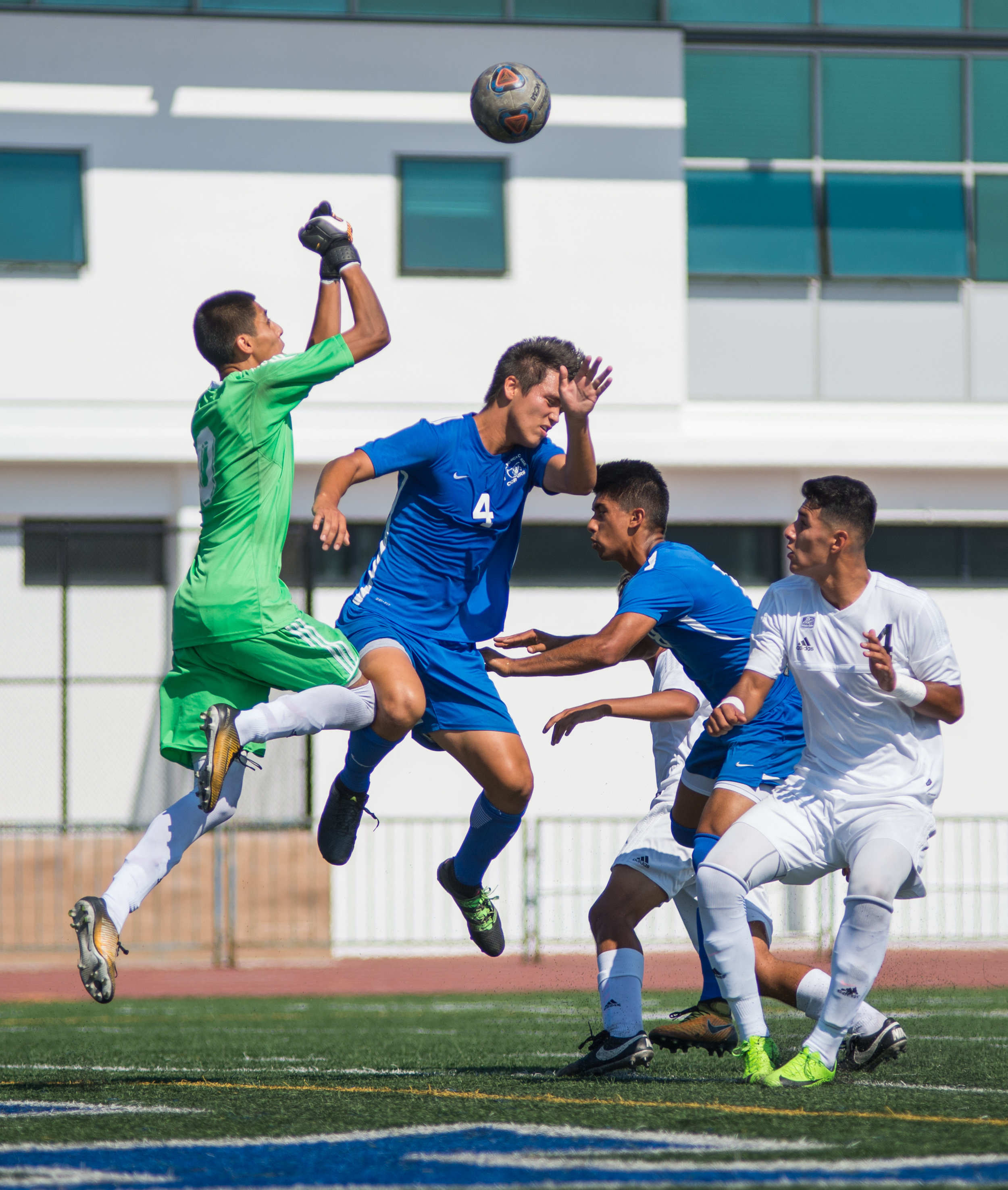  Santa Monica College Corsair Cesar Oliva (4) (CTR) goes up for a header against Citrus College Owl Jorge Quinones (0) (L) on Tuesday September 26, 2017 on the Corsair Field at Santa Monica College in Santa Monica, California. The Corsairs tied the g