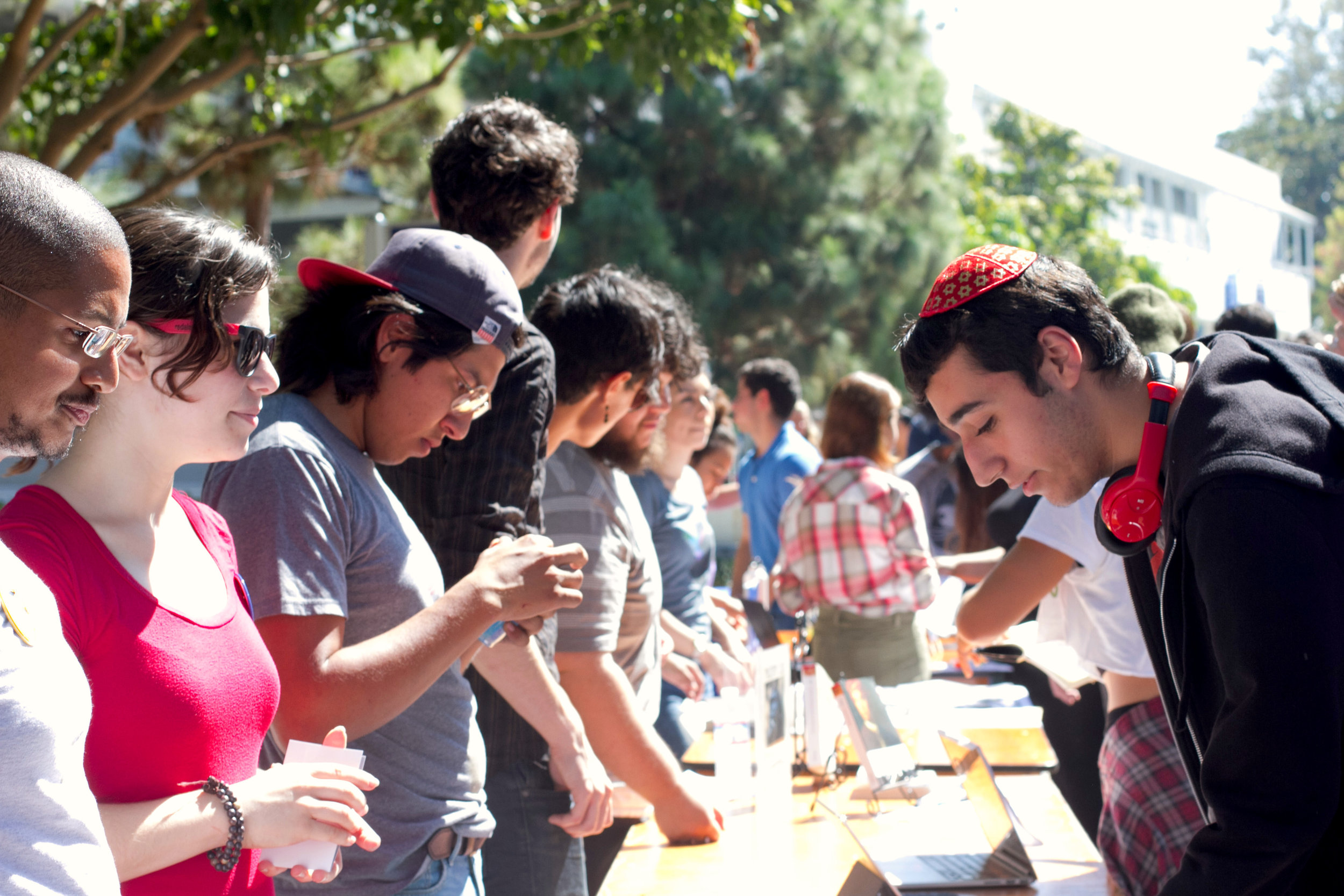  (L to R) Co-President of the club Turning Point USA Liberty Fuchs informing student Faraz Moallemi about the stand the club takes during Club Awareness Day at Santa Monica College in Santa Monica, Calif., September 28, 2017. (Photo By: Rips Avetisya