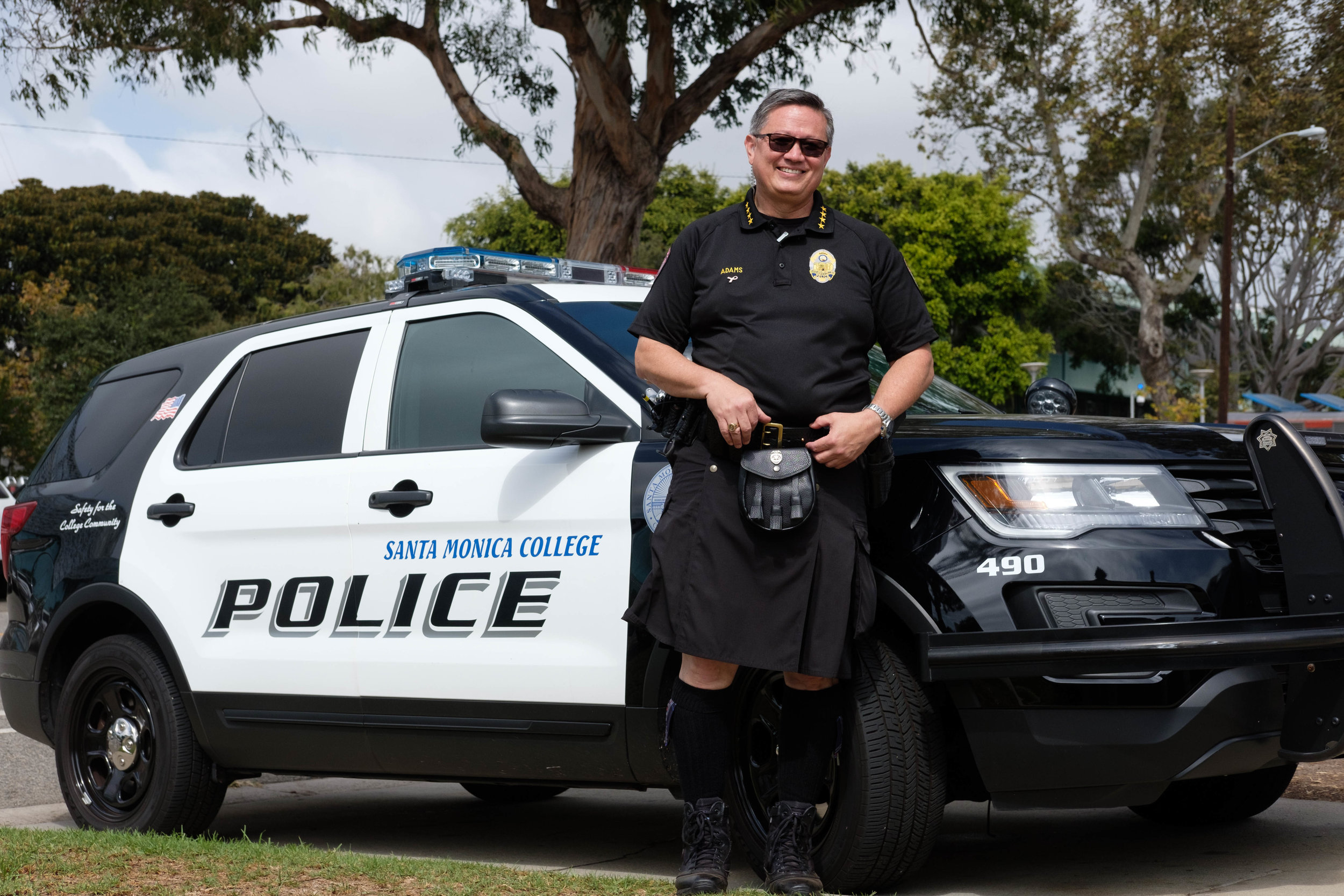  Chief of Police, Johnnie Adams poses for a portrait while wearing a 5.11 tactical kilt. Adams promised to wear the kilt if $750 was raised for Breast Cancer Awareness. Photo by: Jayrol San Jose 