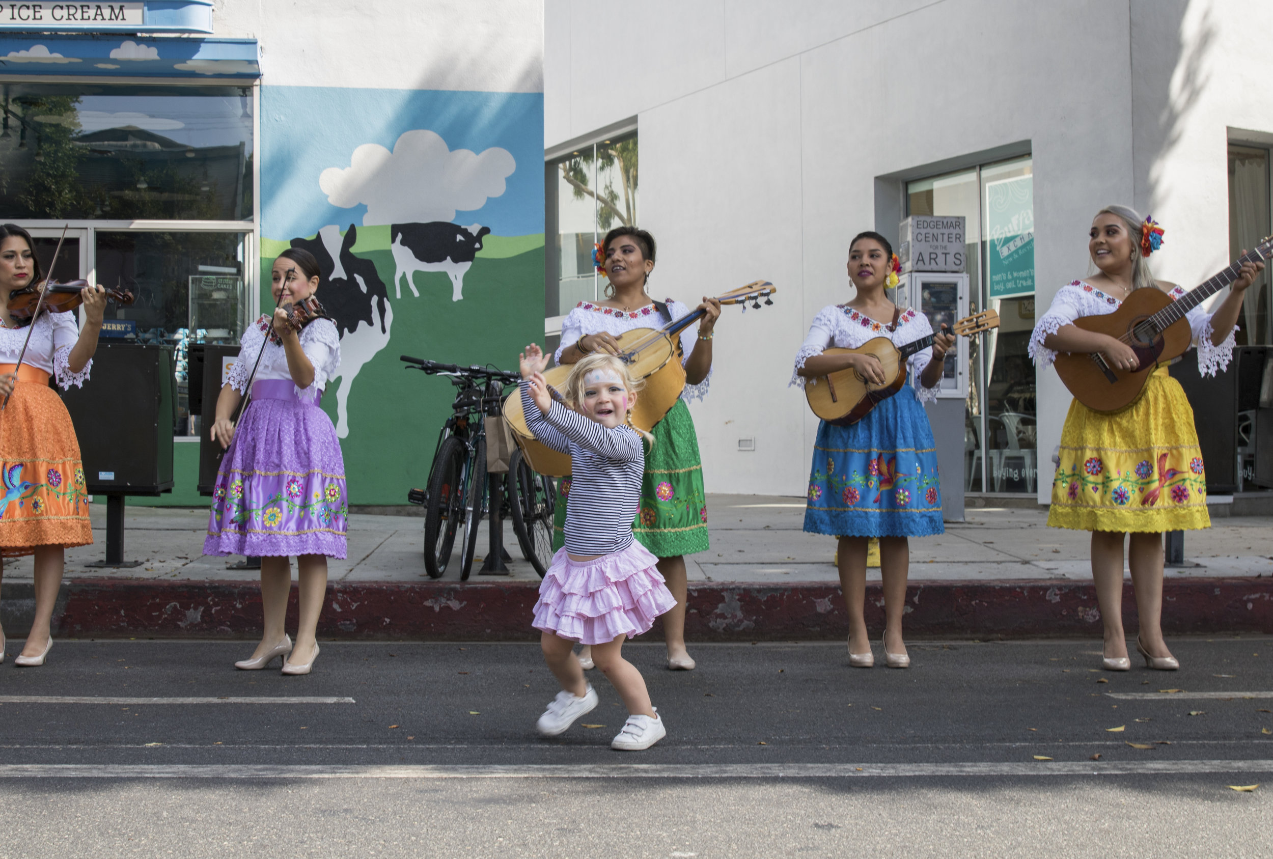  Sophia Nordby (center) dances along to the performance of Las Colibrí, an all-string female mariachi band who performed on Main Street during the City of Santa Monica's Open Streets Festival which took place on October 1, 2017. Photo by: Zane Meyer-