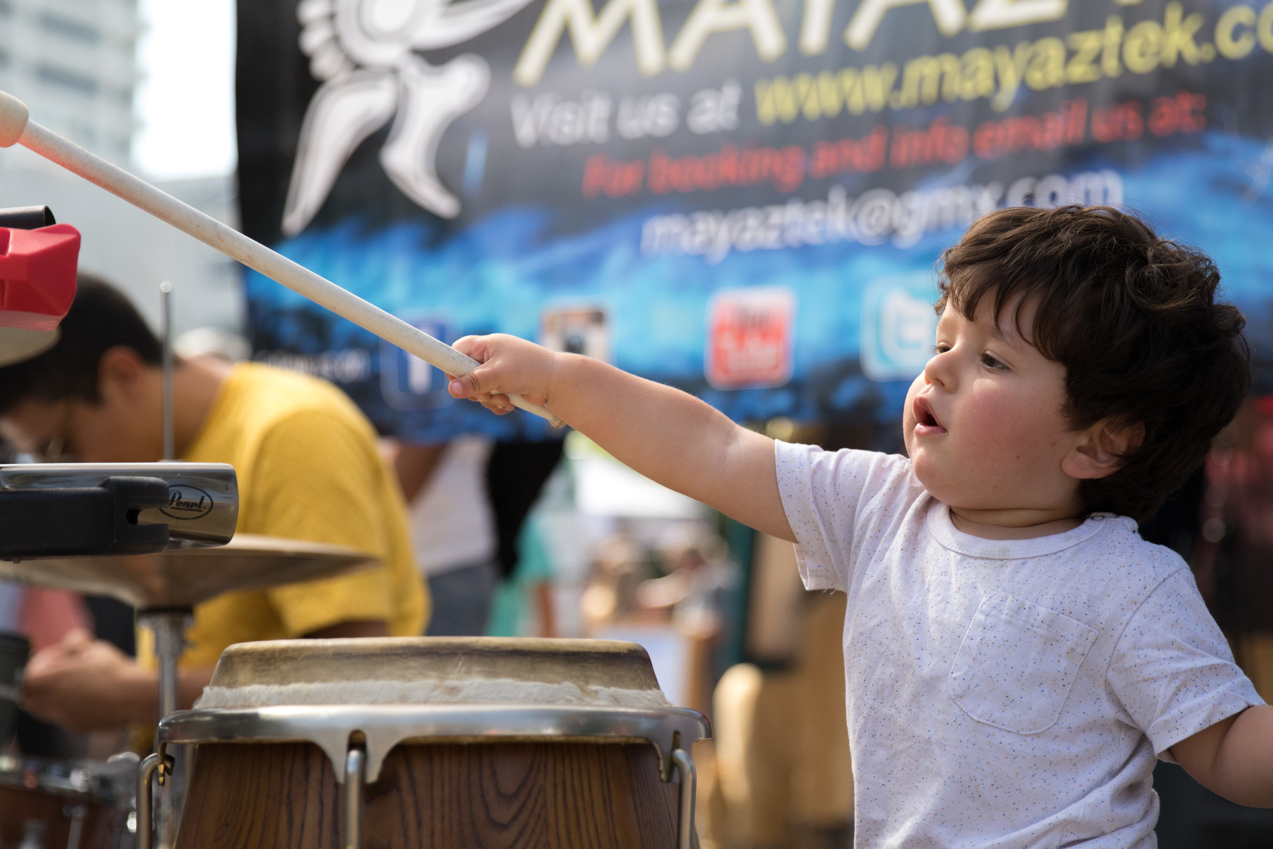  Ofeck Sharon tries to play the drums after the performance of "Mayaztek". Their performance was one of many at the City of Santa Monica's Open Streets Festival (COAST) which took place on October 1, 2017. (Photo By: Zane Meyer-Thornton) 