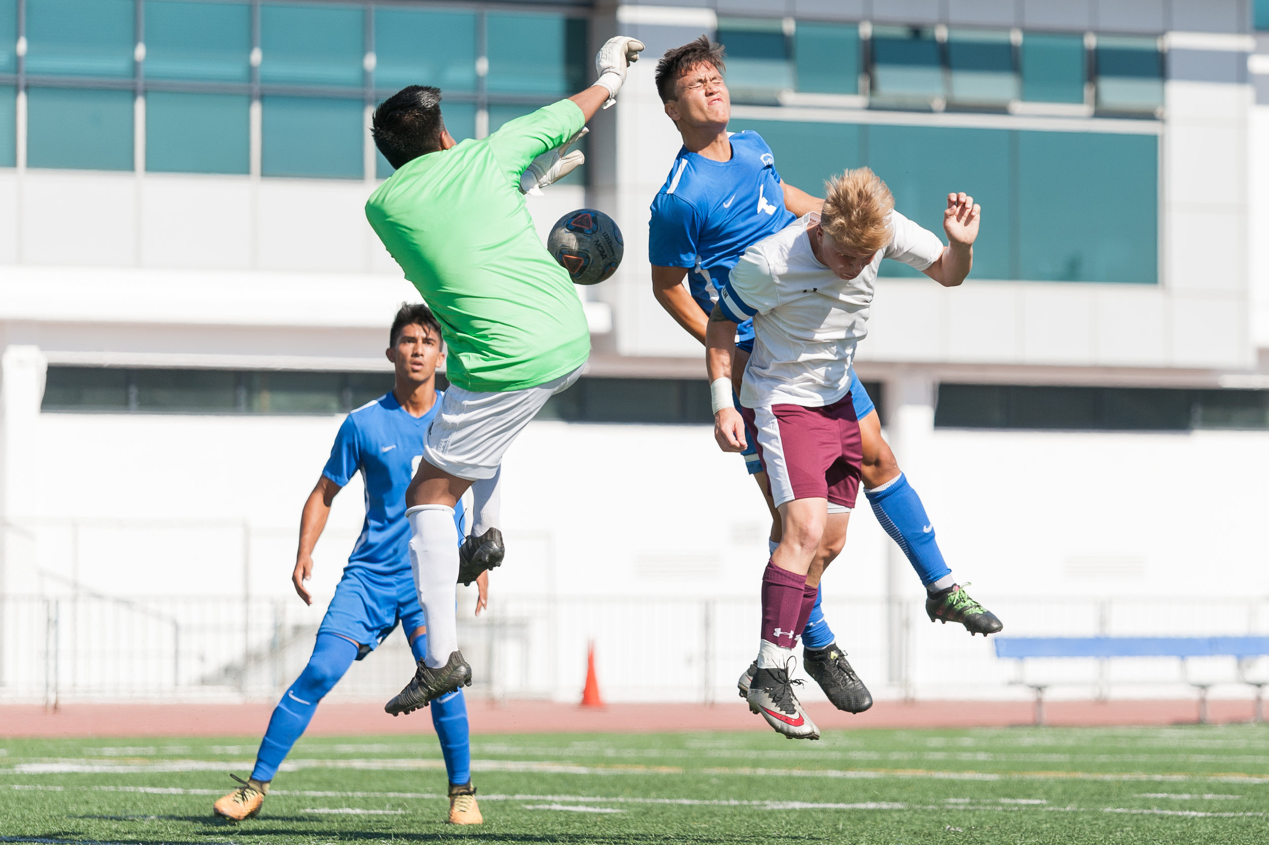  Defender Cesar Olivia (4,center) of Santa Monica College attempts a header to score a goal against Victor Valley College. The Santa Monica College Corsairs won the game 2-0 against the Victor Valley Rams. The match was held at the Corsair Stadium at