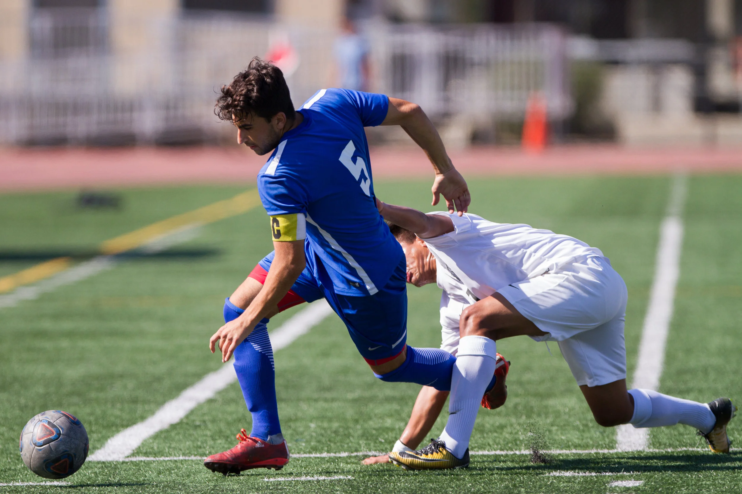  Santa Monica College Corsair Rudi Ibrahim (5) (L) fights for possession of the ball against Moorpark College Raider Cesar Ramirez (7) (R) on Tuesday, October 10, 2017, on the Corsair Field at Santa Monica College in Santa Monica, California. The Cor