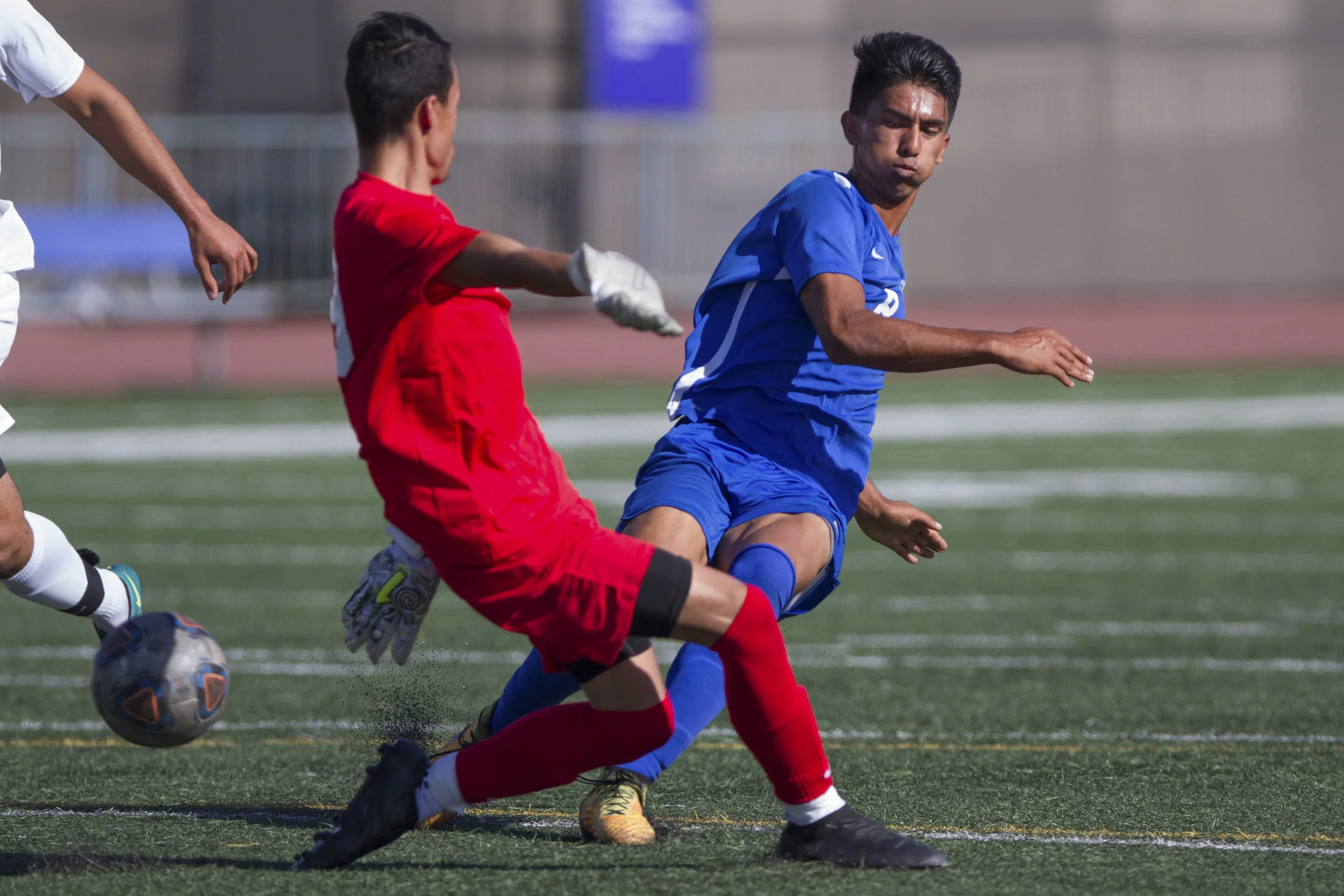  Santa Monica College Corsair Andy Naidu (8) (R) kicks the ball past Moorpark College Raider Kobi Vega (29) (L) and scores his second goal on Tuesday, October 10, 2017, on the Corsair Field at Santa Monica College in Santa Monica, California. The Cor