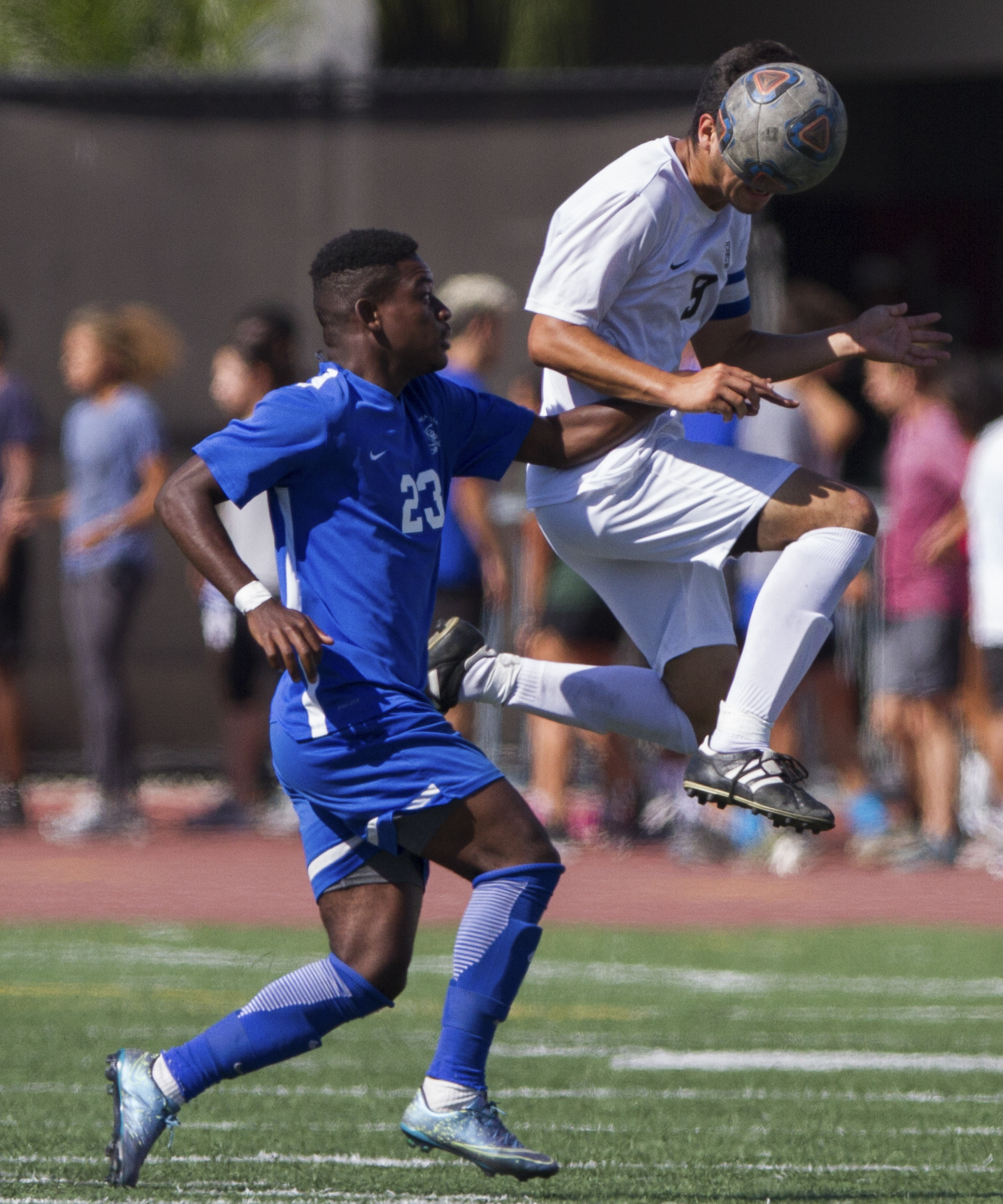  Santa Monica College Corsair Divine Sumbu (23) (L) attempts to get possession of the ball against Moorpark College Raider Angel Perez (9) (R) on Tuesday, October 10, 2017, on the Corsair Field at Santa Monica College in Santa Monica, California. The