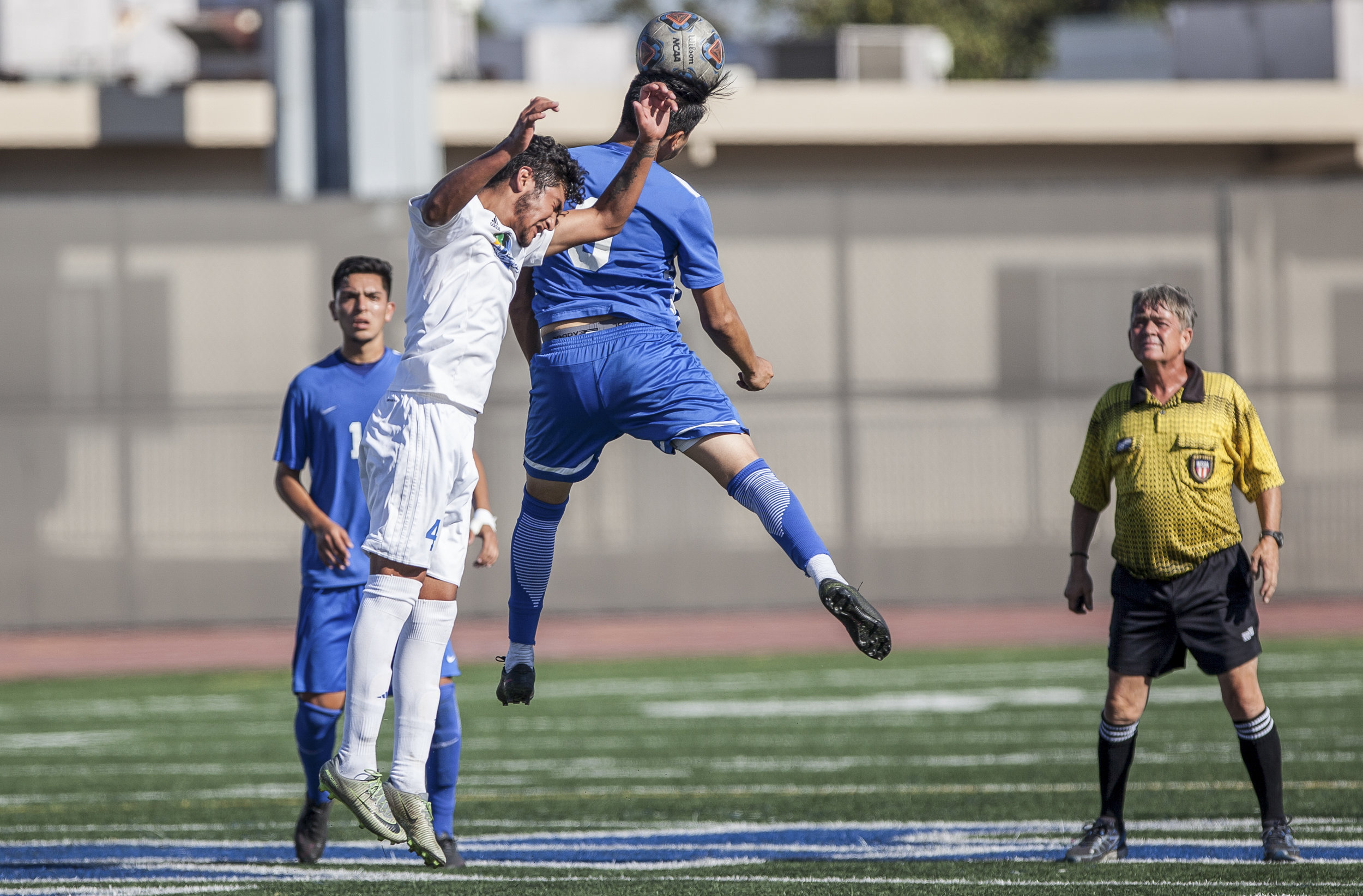  Chris Negrete (9) of the Santa Monica College  jumps up to perform the ball.  The Santa Monica College Corsairs won the game 2-0 against the Oxnard College. The match was held at the Corsair Stadium in Santa Monica, Calif. on October 17, 2017. (Phot