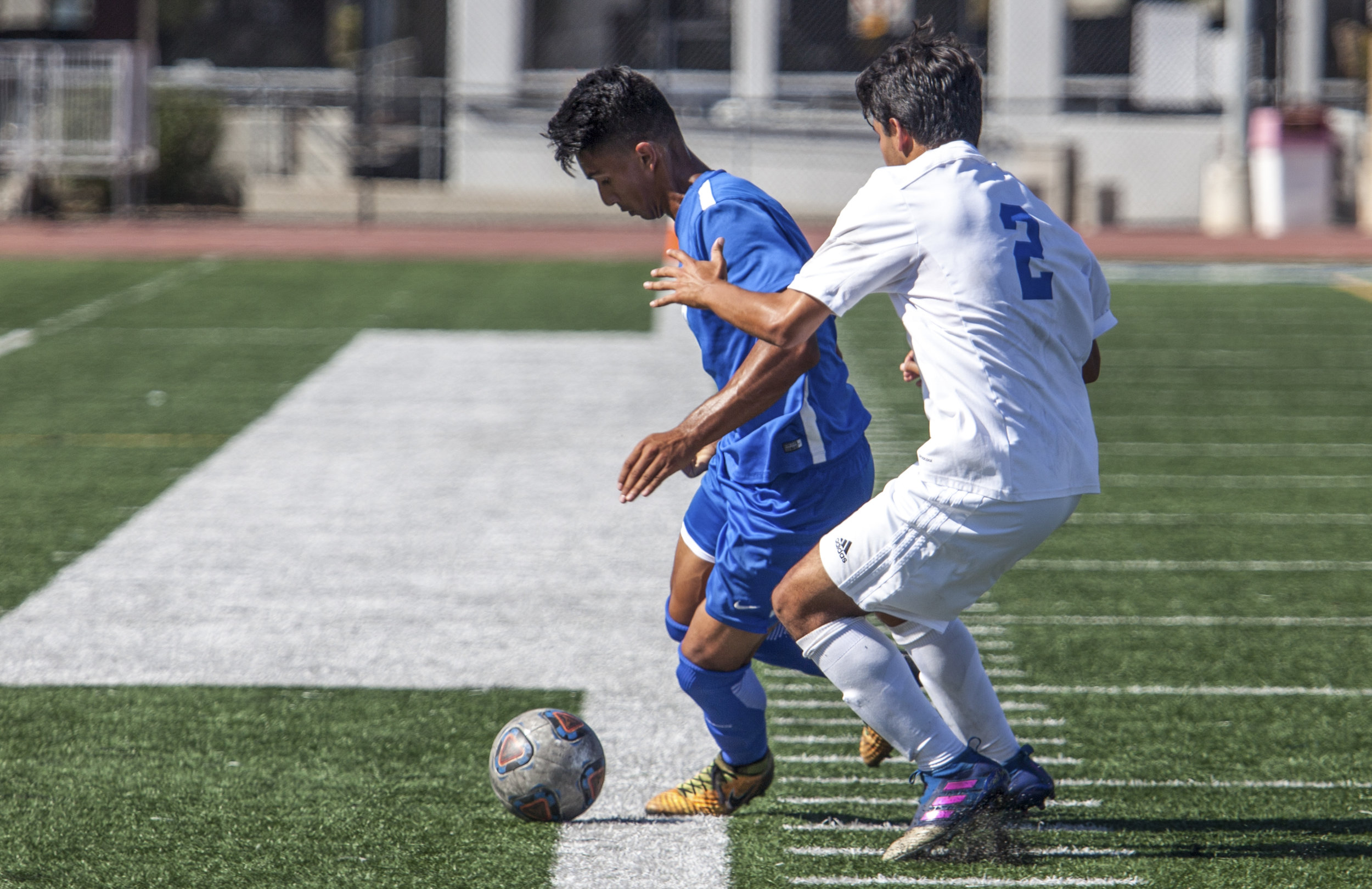  Andy Naidu (8) of the Santa Monica College protects the ball from Francisco Arroyo (2) of Oxnard College. On October 17, 2017 the Santa Monica College Corsairs won the game 2-0 against the Oxnard College. The match was held at the Corsair Stadium in