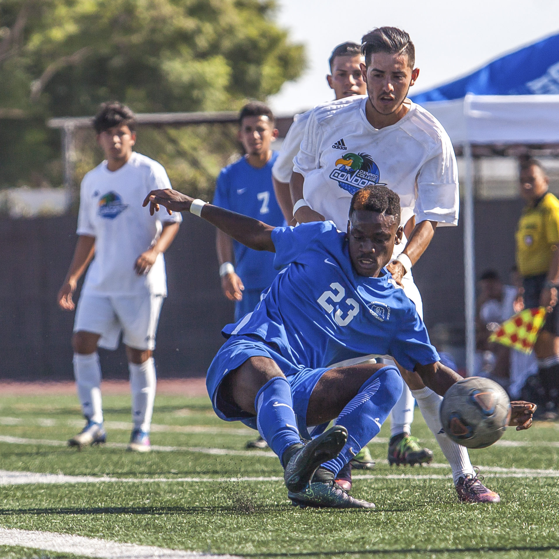  Divine Sumbu (23) of the Santa Monica College knocks out the ball from Luis Rivera (10) of Oxnard College.  On October 17, 2017 the Santa Monica College Corsairs won the game 2-0 against the Oxnard College. The match was held at the Corsair Stadium 