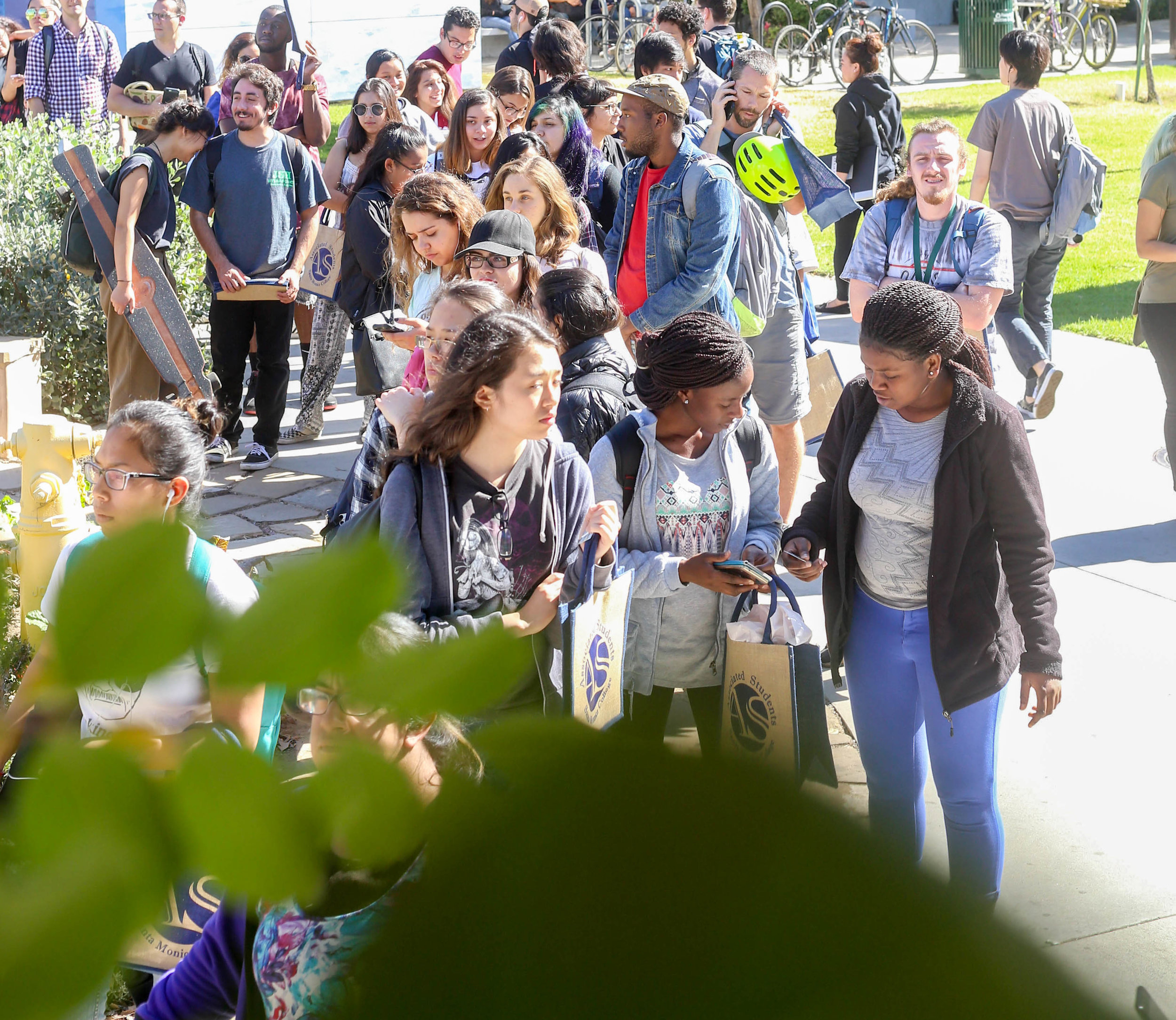  A long line of students wait near  the Organic Learning Garden for their free produce at 11 am that is put on by the Associated Students for Sustainability week at Santa Monica College's Main Campus in Santa Monica, Calif on Monday, October 16th 201
