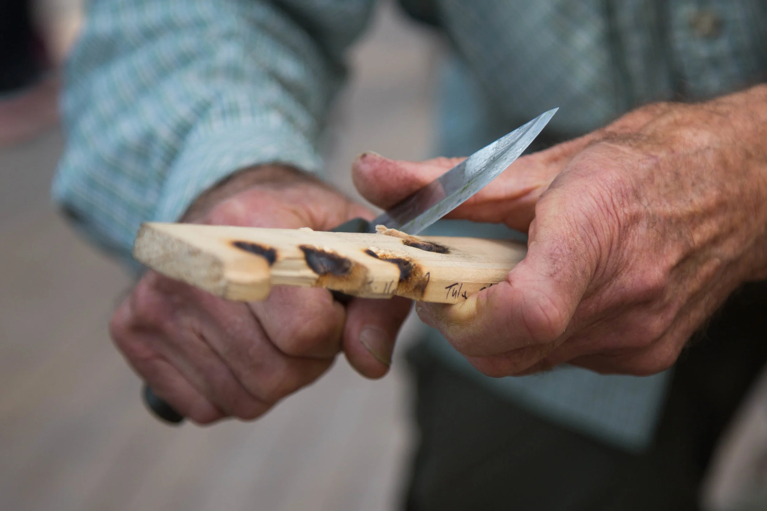  Jim Robertson, the president of Aboriginal Skills cutting wood for making fire at Sustainability Fair on Tuesday, October 17th, 2017 at Quad, Santa Monica College in Santa Monica, California. (Photo by Yuki Iwamura) 