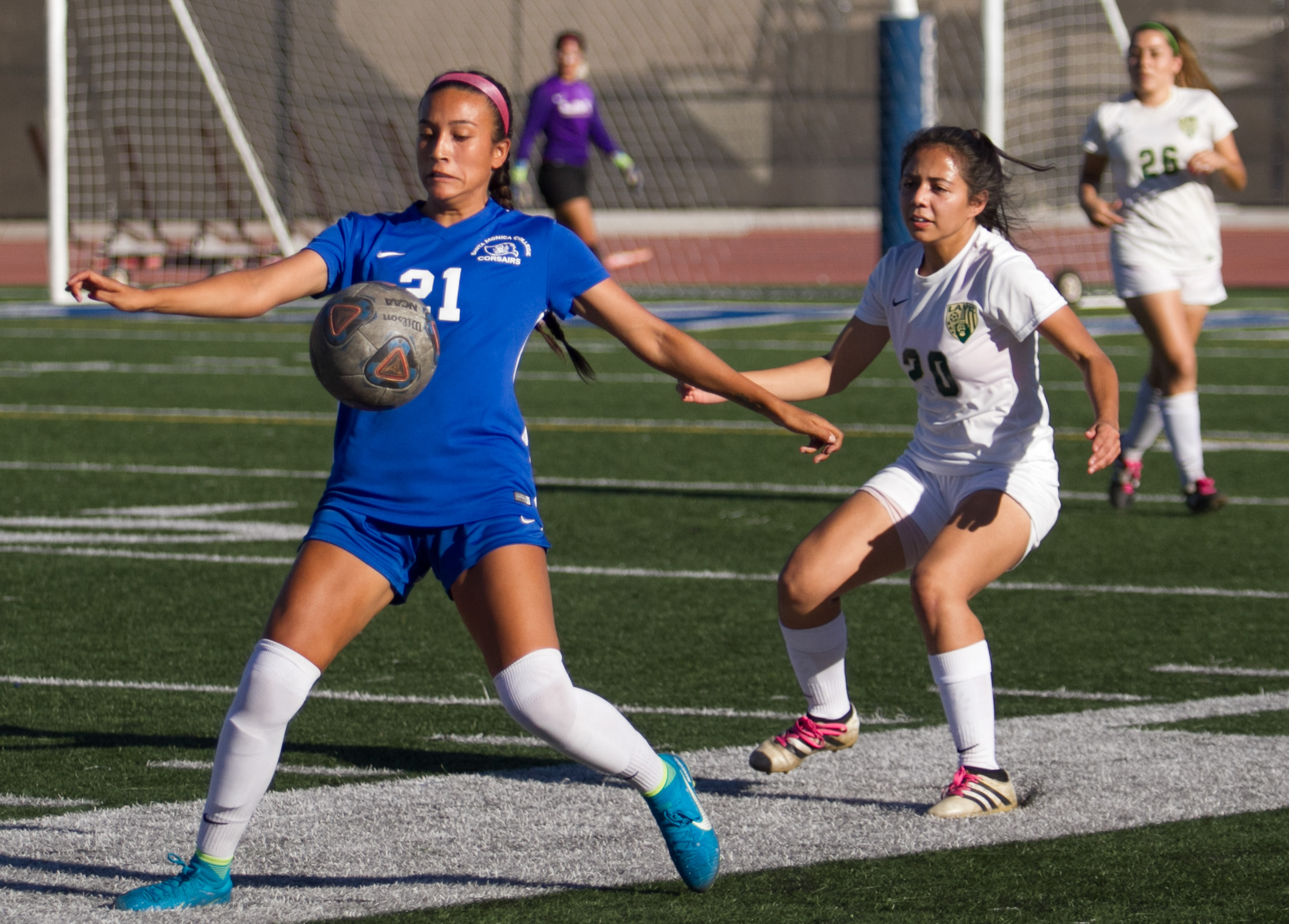  Santa Monica College Corsair Meredith Gomez (21)(L) attempts to control the ball against LA Valley College Monarch Alma Medina (20)(R) on Tuesday, October 24, 2017, on the Corsair Field at Santa Monica College in Santa Monica, California. The Corsai