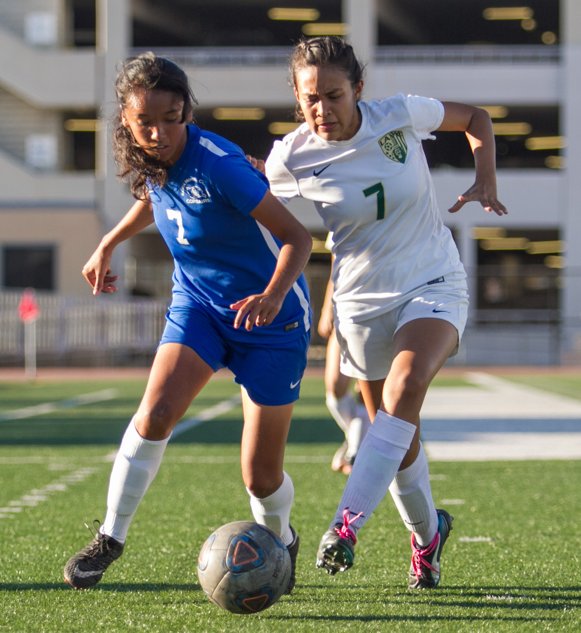  Santa Monica College Corsair Josseline Espinoza (7)(L) fights for possession of the ball against LA Valley College Monarch Alexis Orozco (7)(R) on Tuesday, October 24, 2017, on the Corsair Field at Santa Monica College in Santa Monica, California. T