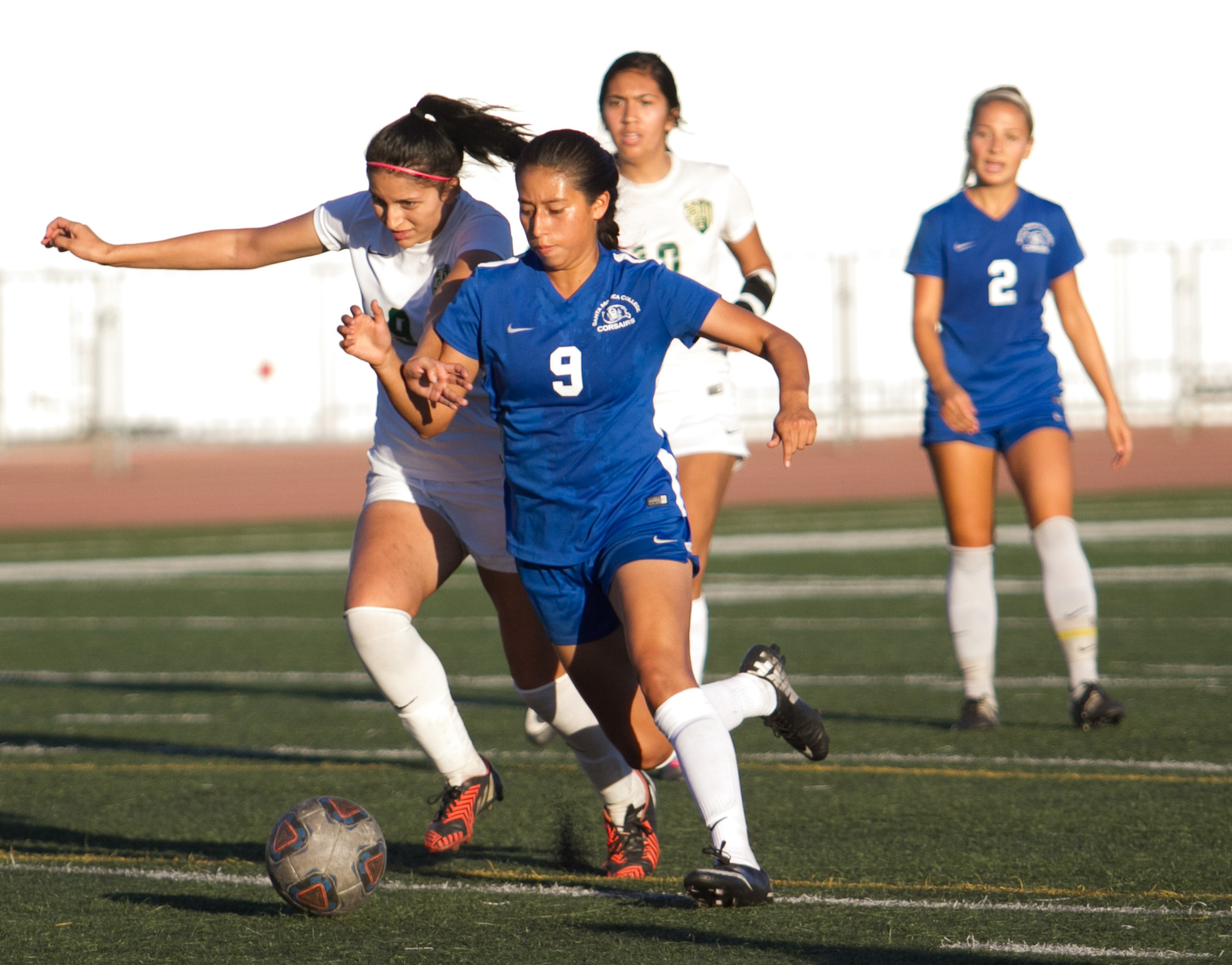  Santa Monica College Corsair Ashley Martinez (9)(R) fights for possession of the ball against LA Valley College Monarch Angie Aguirre (9)(L) on Tuesday, October 24, 2017, on the Corsair Field at Santa Monica College in Santa Monica, California. The 