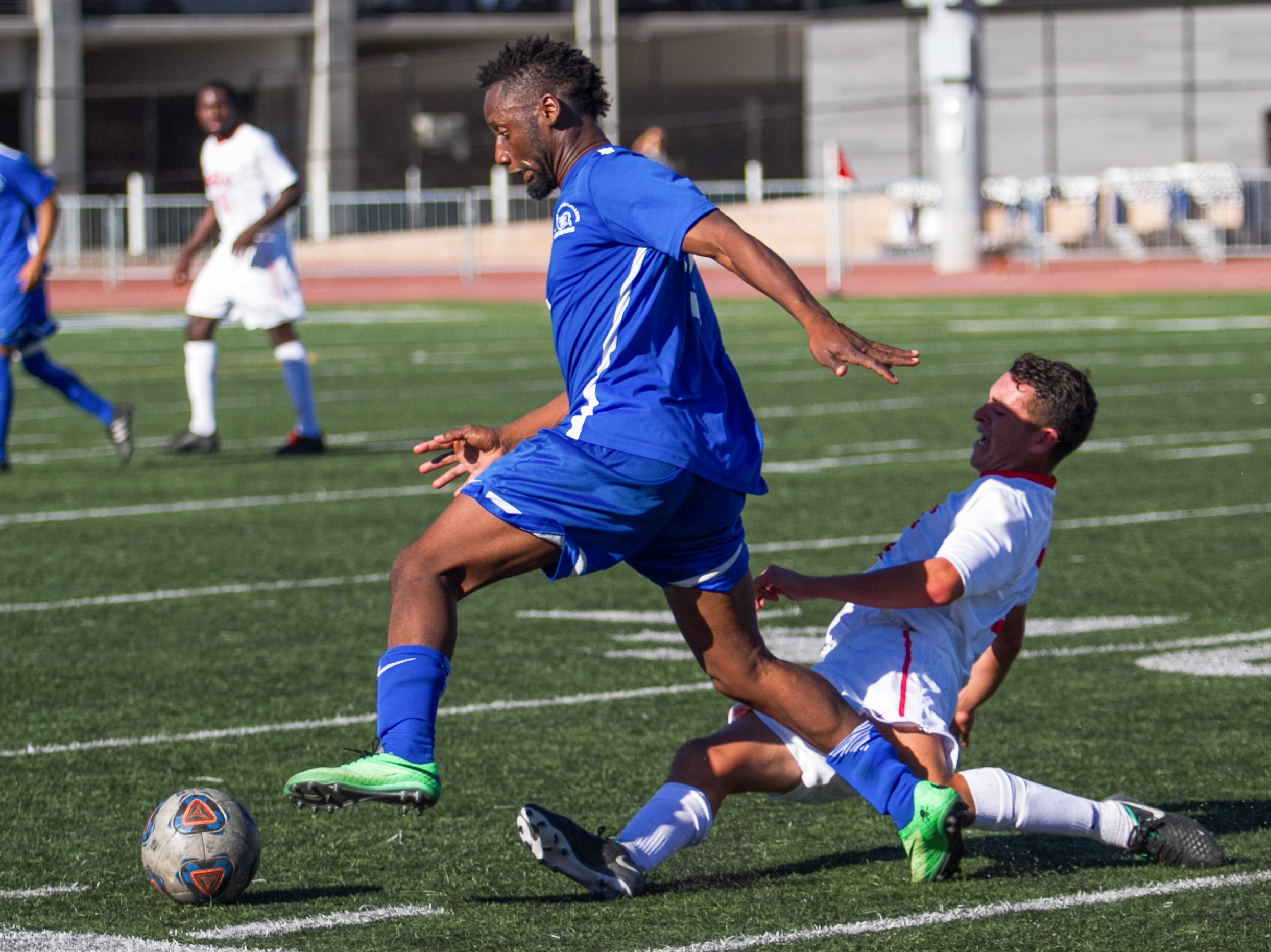  Santa Monica College Corsair Cyrille Njomo (17)(L) fights for possession of the ball  against Santa Barbara City College Vaquero Jessie Jimenez (8)(R) on Tuesday, October 24, 2017, on the Corsair Field at Santa Monica College in Santa Monica, Califo