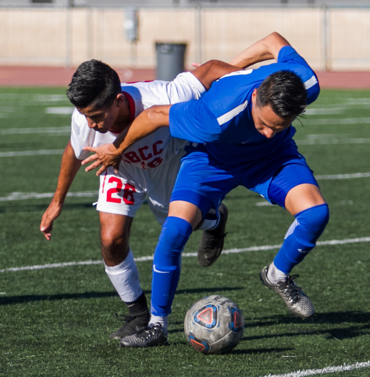  Santa Monica College Corsair Chris Negrete (9)(R) fights for possession of the ball against Santa Barbara City College Vaquero Adrian Gamez (28)(L) on Tuesday, October 24, 2017, on the Corsair Field at Santa Monica College in Santa Monica, Californi