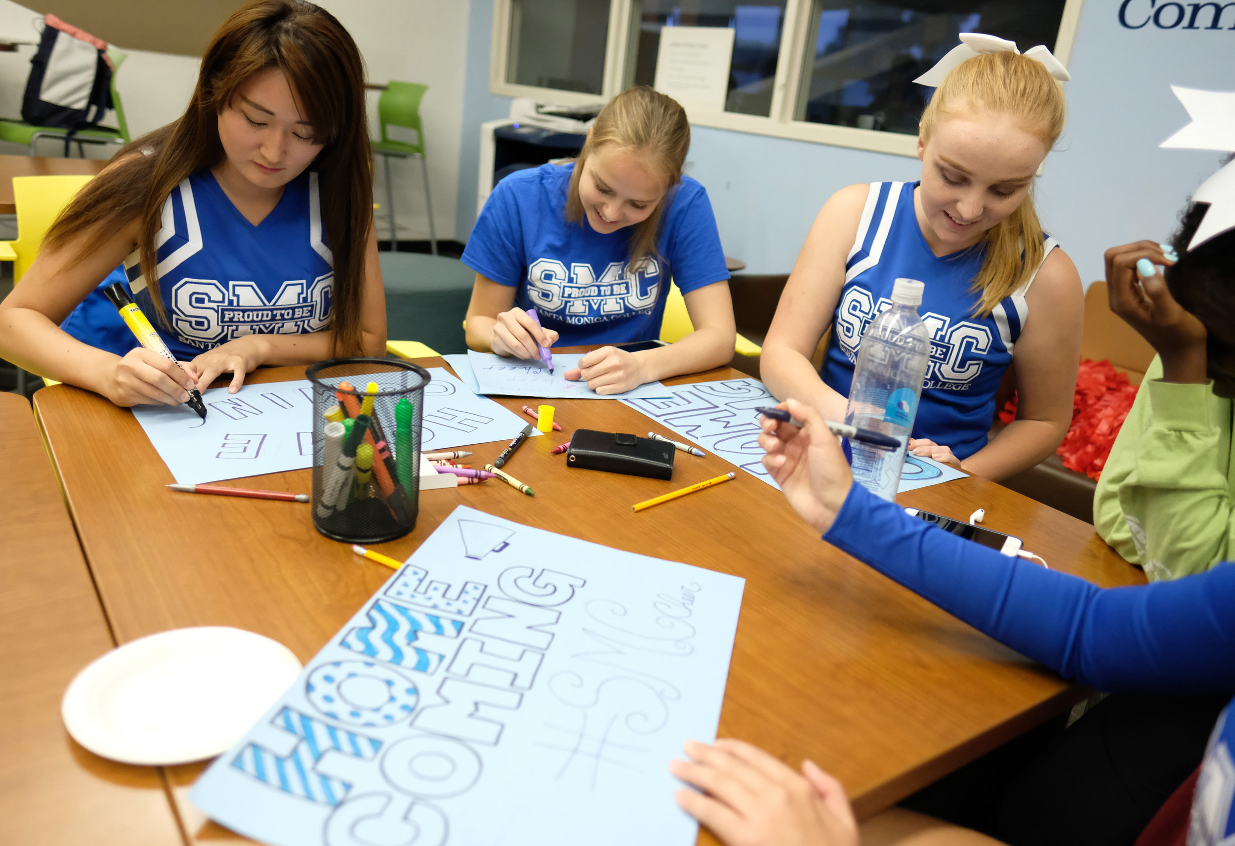  The Santa Monica Cheerleading team creating posters with Homecoming in mind for the poster contest during the Monday Night Football event for Spirit Week in Santa Monica College in Santa Monica, CALIF on October 30, 2017. (Photo by Jayrol San Jose) 