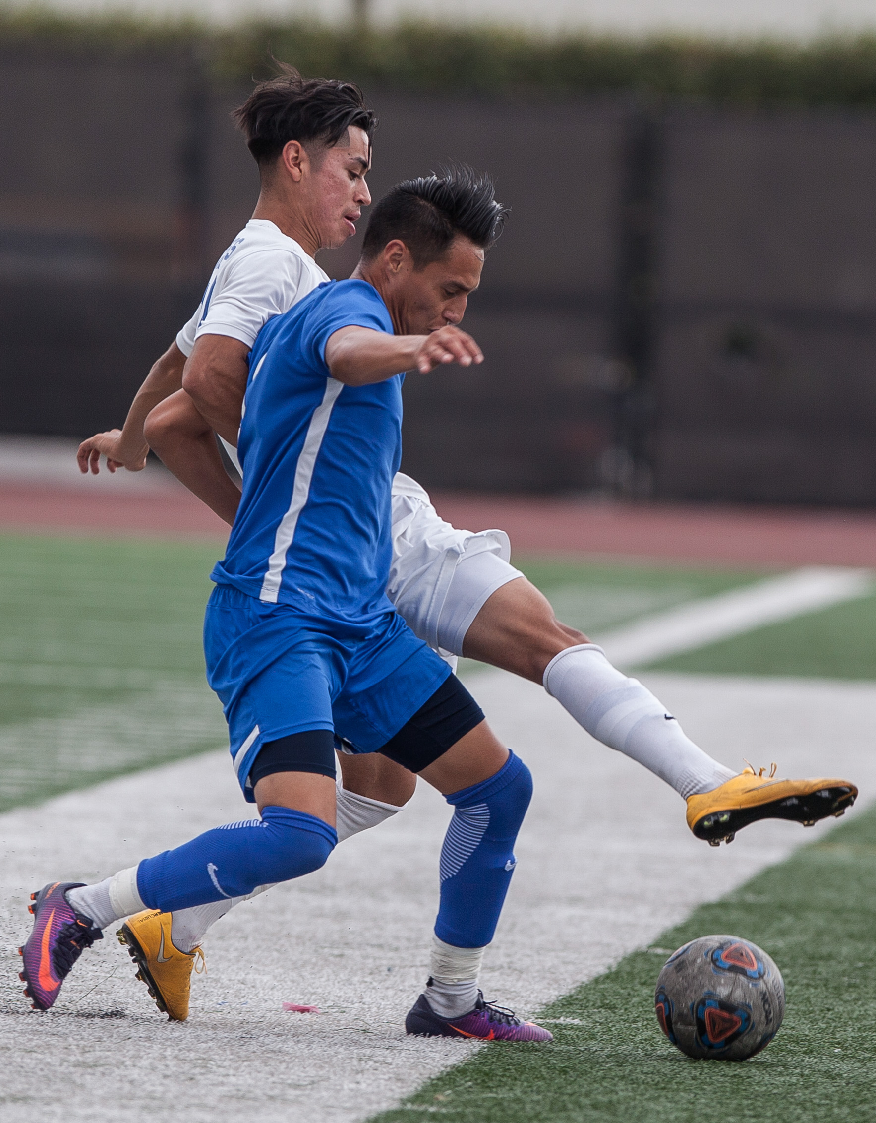  Chris Negrete (9) of the Santa Monica College try to catch the ball from Eric Pulido(14) of the Allan Hancock College.  The game ended 1-1 resulting in a tie. The game was held at the Corsair Stadium at the Santa Monica College Main Campus in Santa 