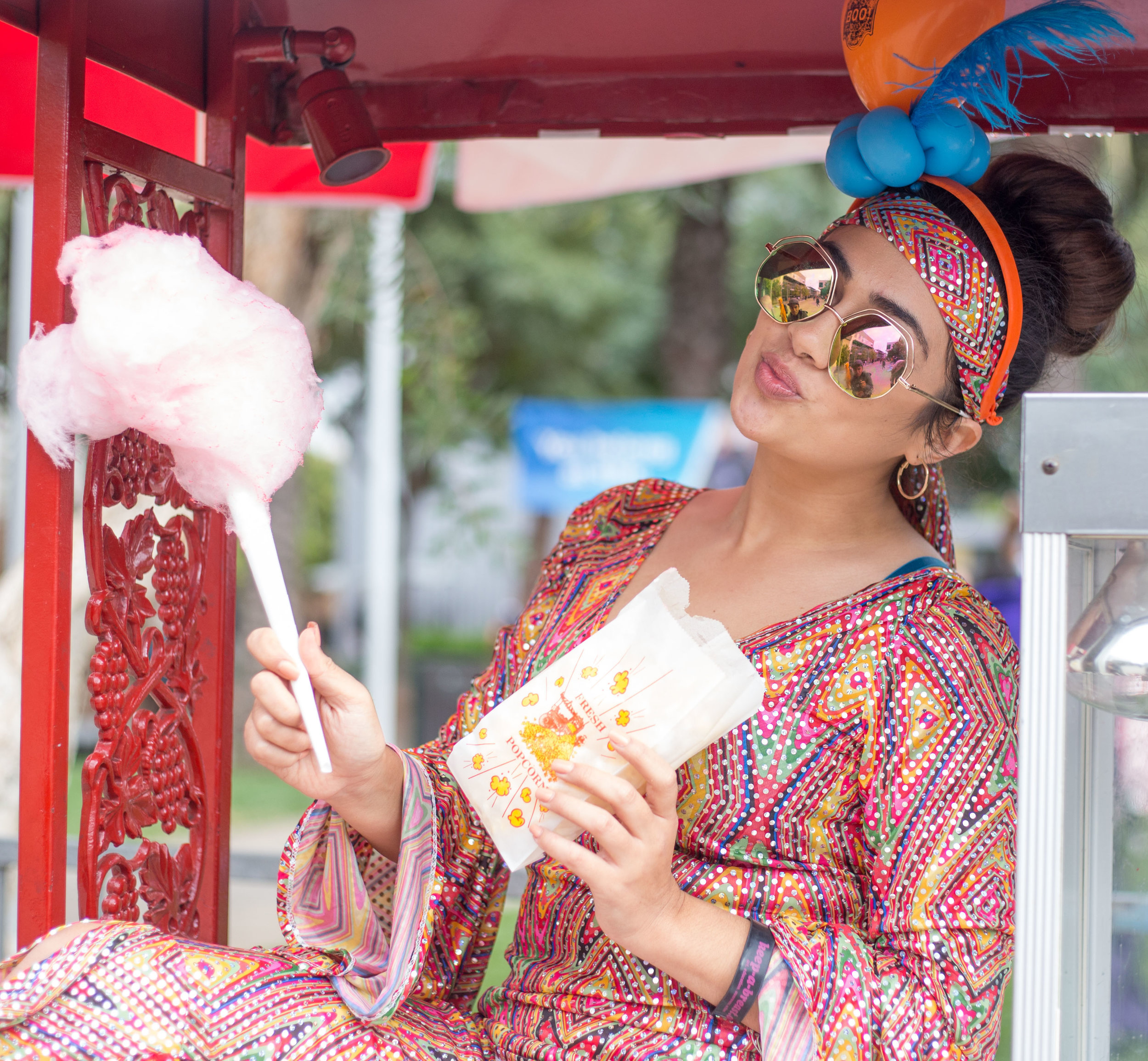  Santa Monica College Buisness Major Leslie Pine is dressed as American singer and actress Cher while she holds free popcorn and cotton candy from the Associated Students' Homecoming Carnival on Halloween on Tuesday, October 31st 2017 at the Santa Mo
