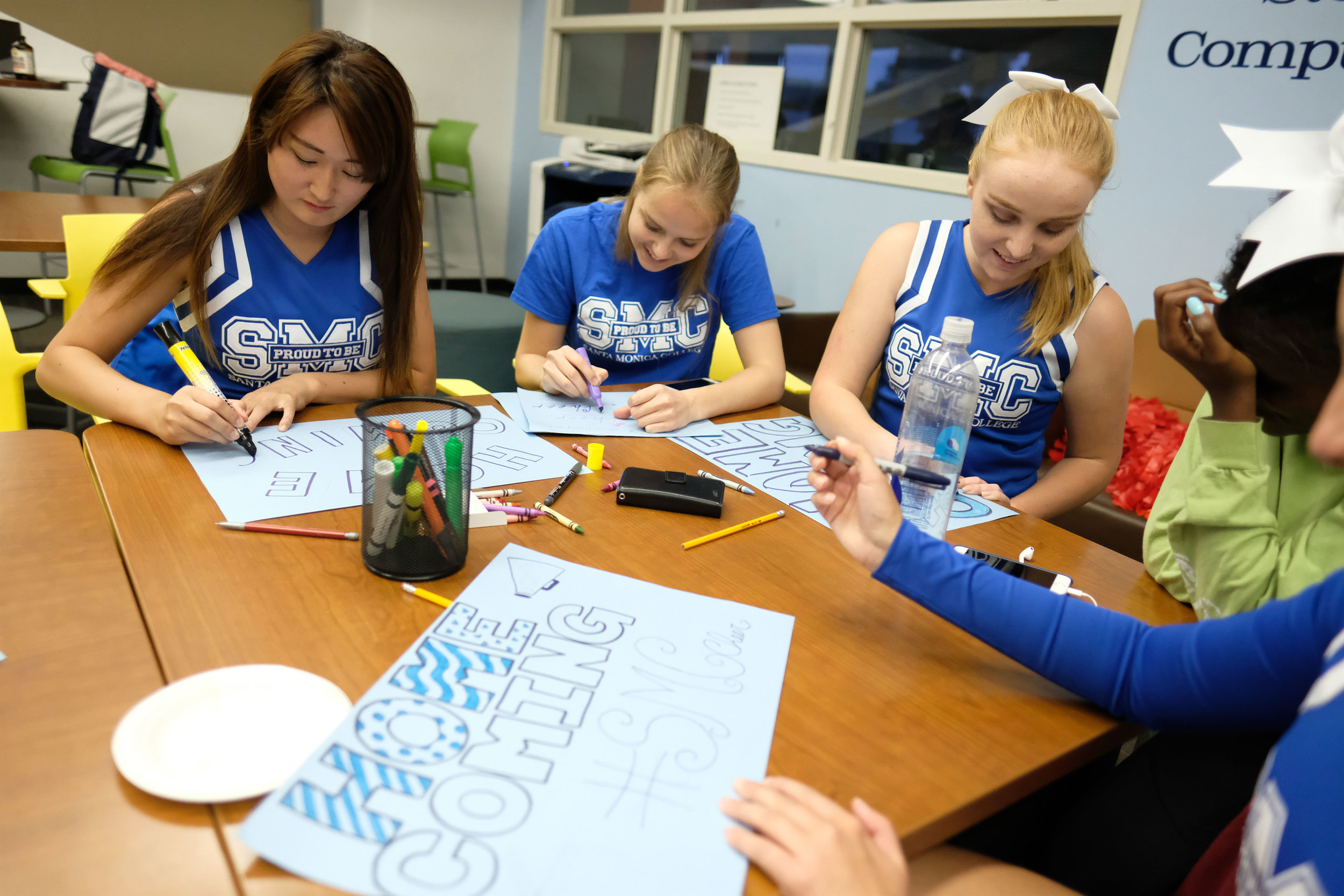  The Santa Monica Cheerleading team creating posters with Homecoming in mind for the poster contest during the Monday Night Football event for Spirit Week in Santa Monica College in Santa Monica, CALIF on October 30, 2017. (Photo by Jayrol San Jose) 
