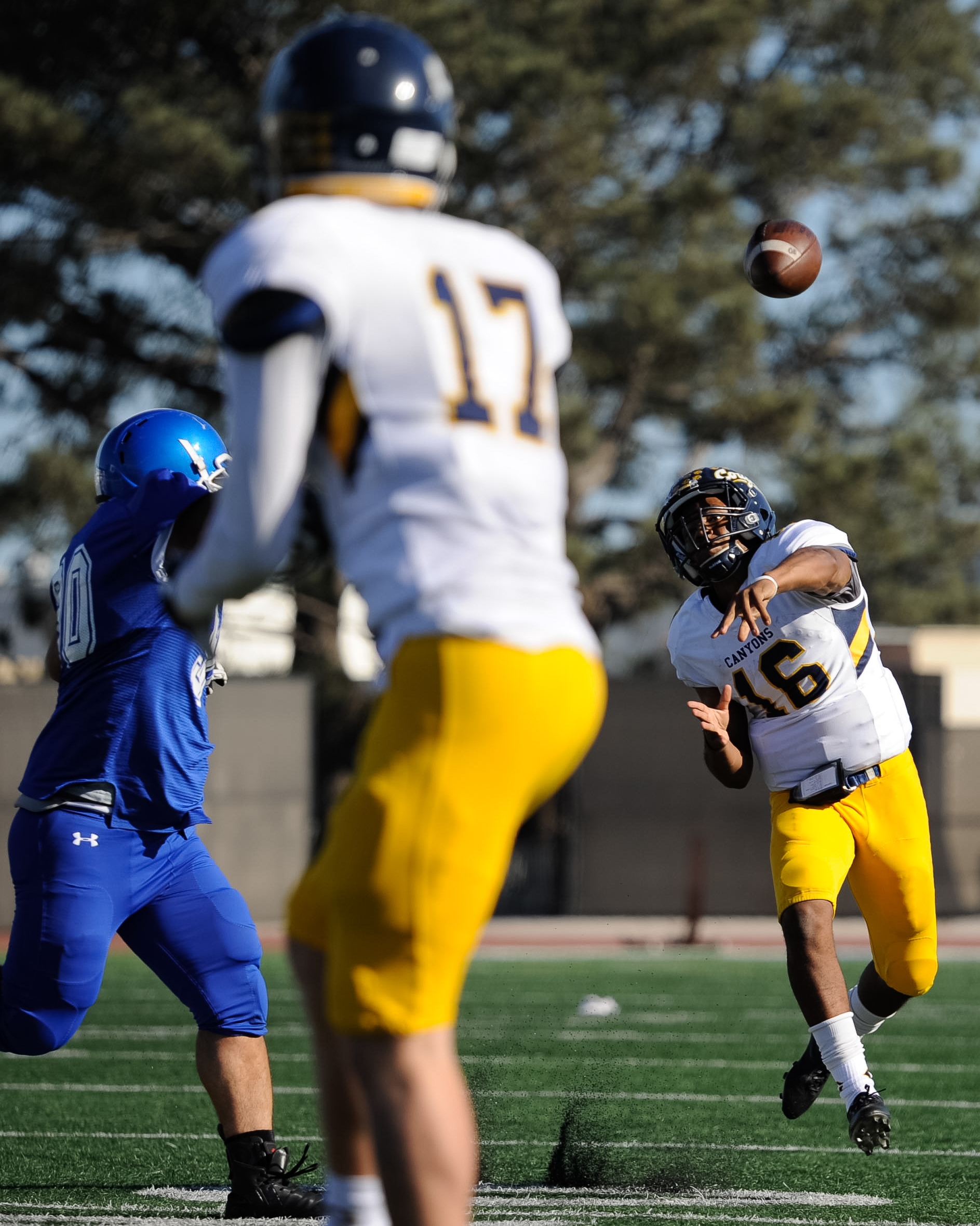  Quarterback Darryn Blackshere (16) of College of the Canyons  passes to wide receiver Hunter Schuessler (17). The Santa Monica College Corsairs lose their final home game 7-48 to the College of the Canyons Cougars and will play their final game of t