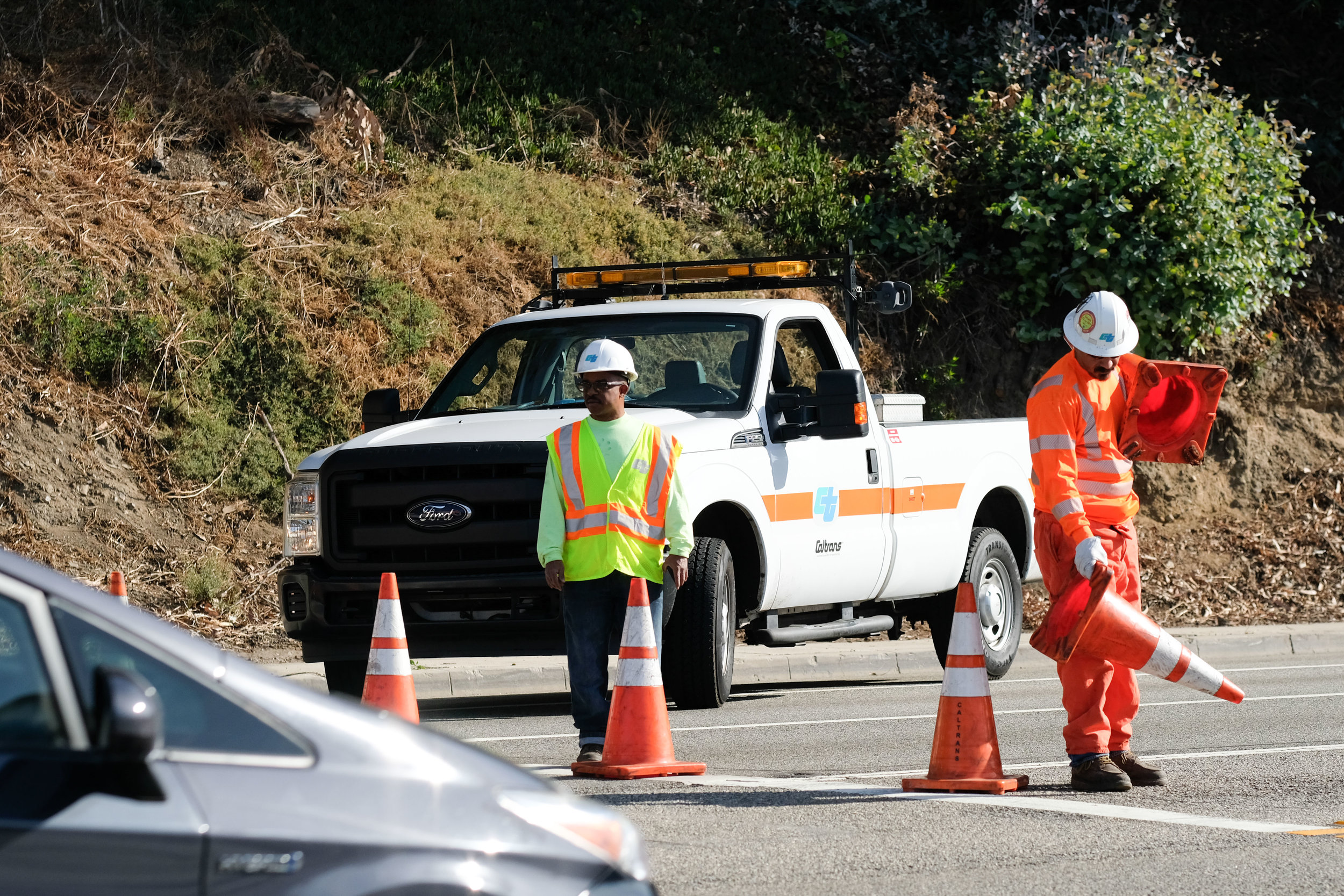  Traffic controllers helping out by placing orange cones stopping any traffic trying to go Northbound on the Pacific Coast Highway 1 on November 21,2017 in Santa Monica, CALIF. (Photo by Jayrol San Jose) 