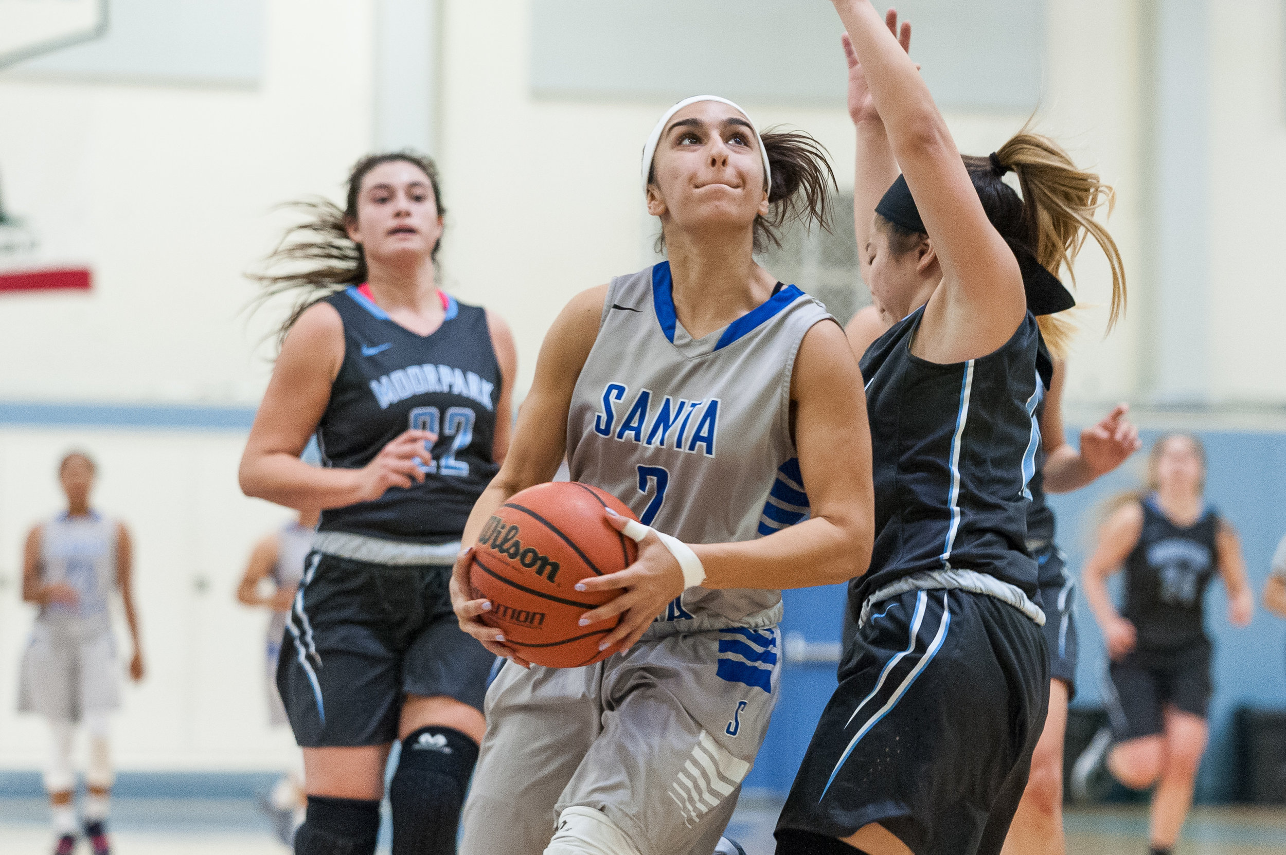  Guard Jessica Melamed (2) of Santa Monica College goes up for a contested layup during a fastbreak. The Santa Monica College Corsairs lose the game 52-69 to the Moorpark College Raiders. The game was held at the SMC Pavilion at the Santa Monica Coll