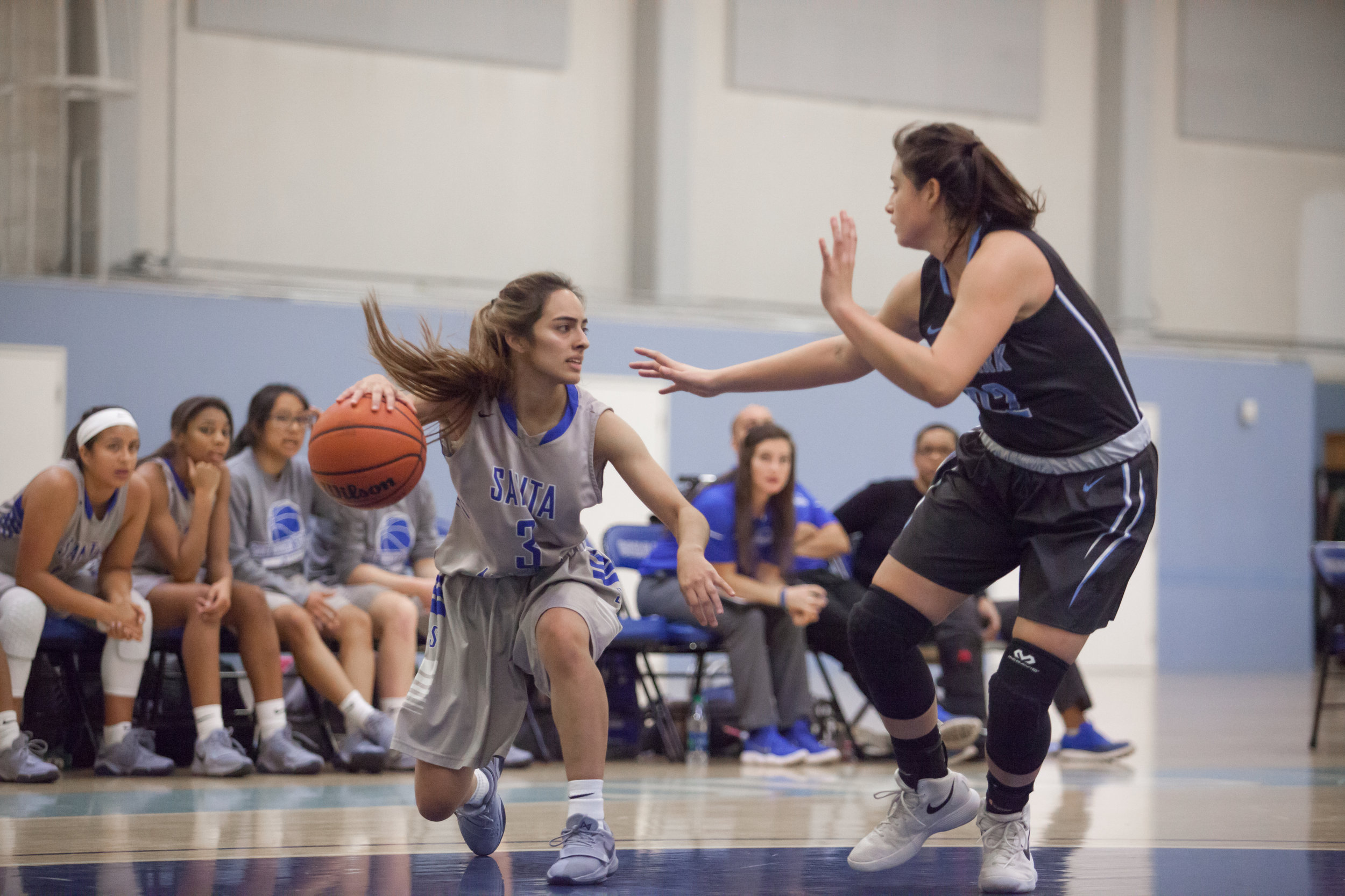  Luna Rivera (3) of the Santa Monica College try to bypass a guard Sydney Arikawa (22) of the Moonpark College. The Santa Monica College Corsairs loss the home game 52-69 against the Moonpark College.   The game held on Saturday, December 9th, 2017 a