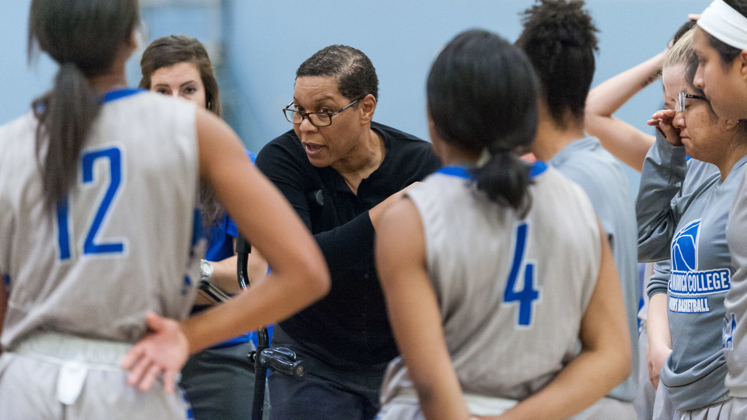  Lydia Strong (Center), Head Coach of the Santa Monica College Women's Basketball Team, tells her team to make a final run during the last few minutes of action. The Santa Monica College Corsairs lose the game 52-69 to the Moorpark College Raiders. T