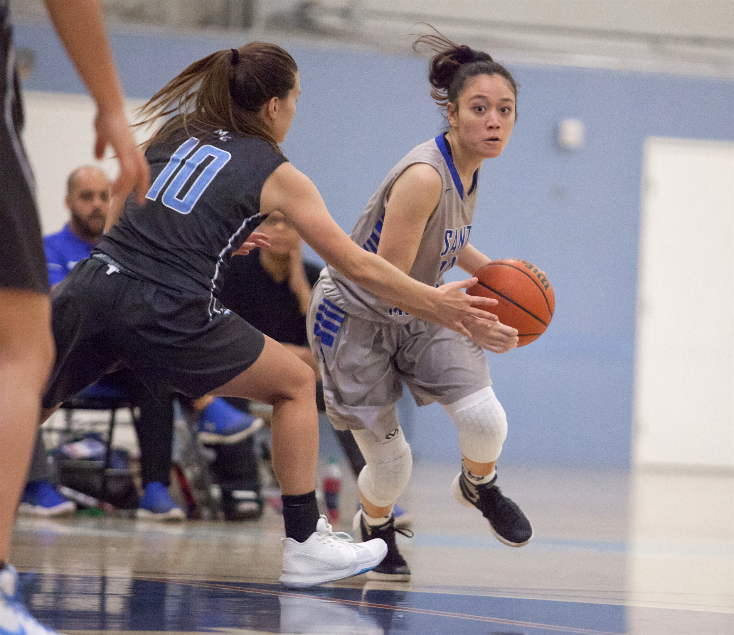  Maylene Cabral (20) of the Santa Monica College to try bypass a guard Emily Herring (10) of the Moonpark College.  The Santa Monica College Corsairs loss the home game 52-69 against the Moonpark College. The game held on Saturday, December 9th, 2017