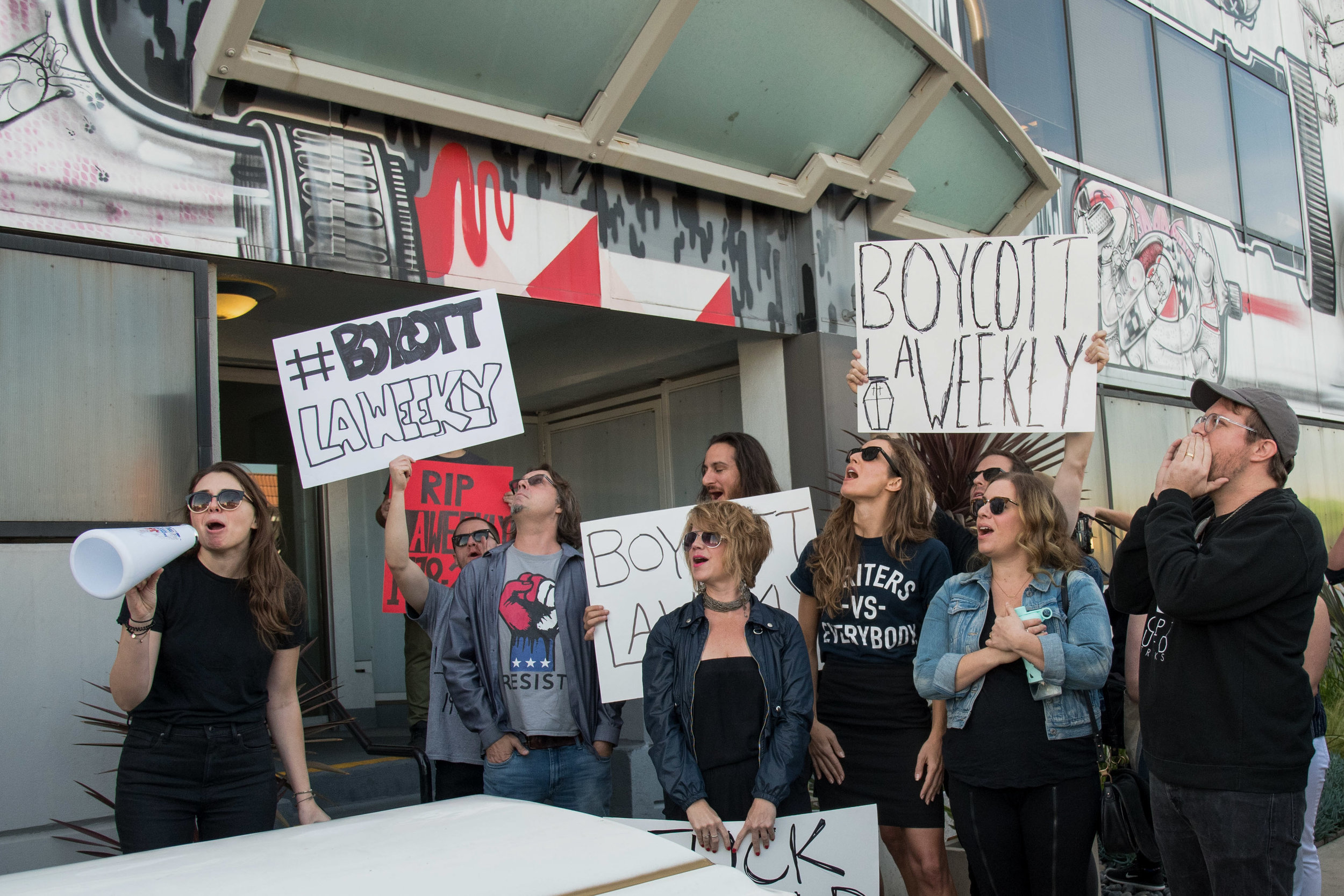 Haley Potiker (left) speaking at the LA Weekly funeral/protest infront of LA Weekly in Culver City, Calif. on Dec. 8th, 2017. Photo by Willow Sando-McCall 