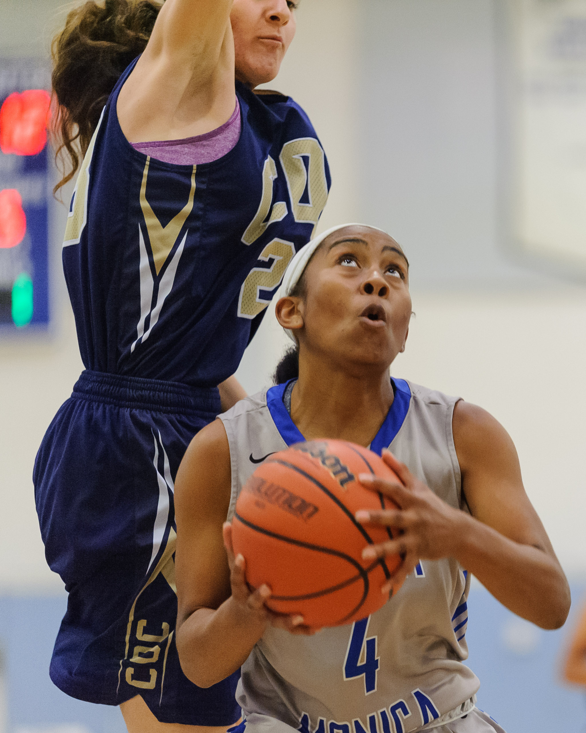  Lisa Hall (4) of Santa Monica College drives into the lane for a layup. The Santa Monica College Corsairs lose the game 108-70 to the College of the Canyons Cougars. The game was held at the SMC Pavilion at the Santa Monica College Main Campus in Sa