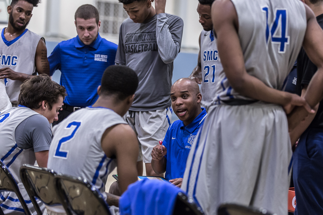  The head men’s basketball coach Joshua Thomas (center) calls for a time out to regroup with his players during the last 5 minutes of the game during the Corsairs’ 103-91 loss to the Pierce College Brahma Bulls at the Santa Monica College Corsair gym