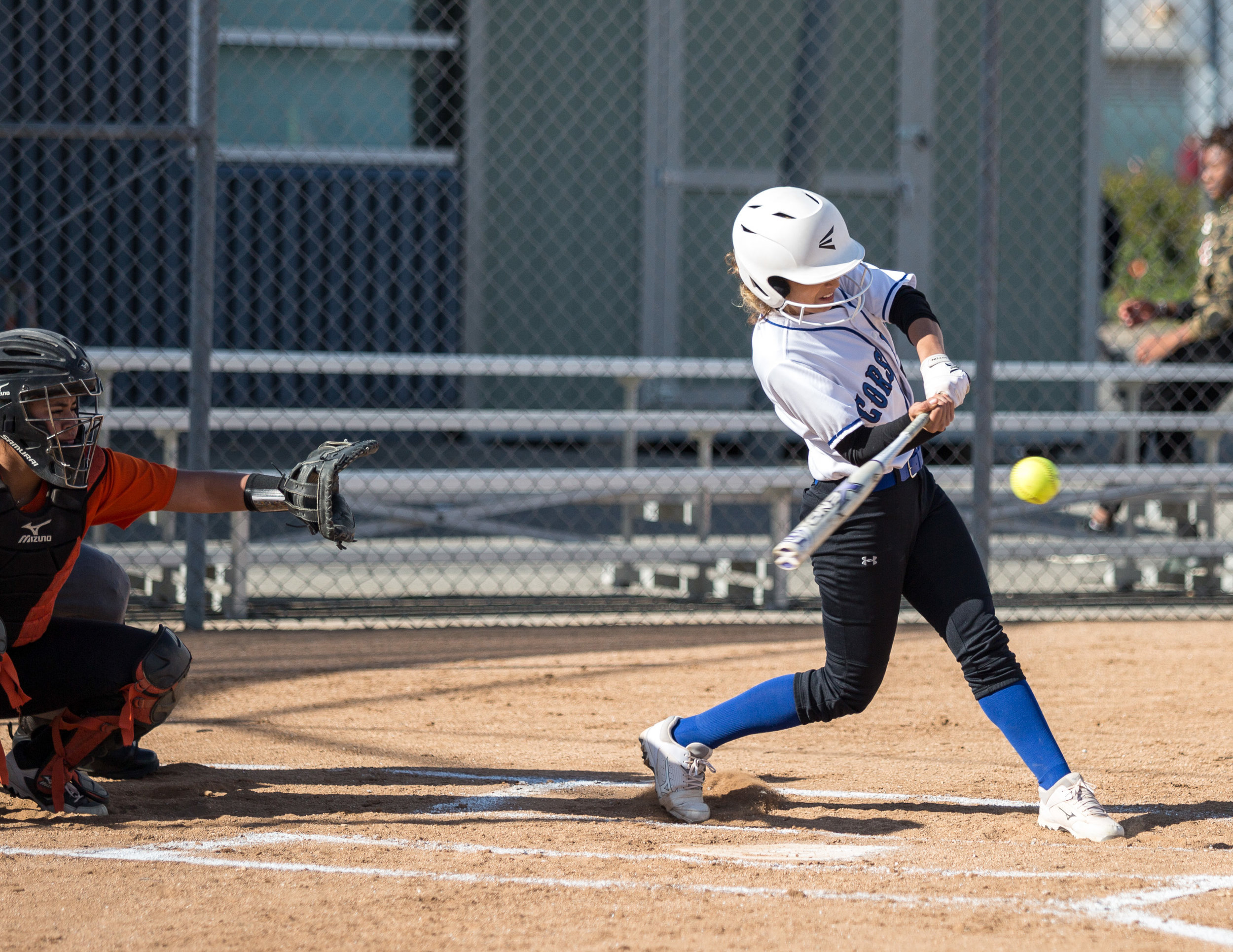  Santa Monica College Corsair freshman infielder Taylor Liebesman #23 (white, right) hits a double during the top of the 2rd at the Corsair Field in Santa Monica California, on Tuesday, February 27 2018. The Corsairs would go on to lose the game 0-14