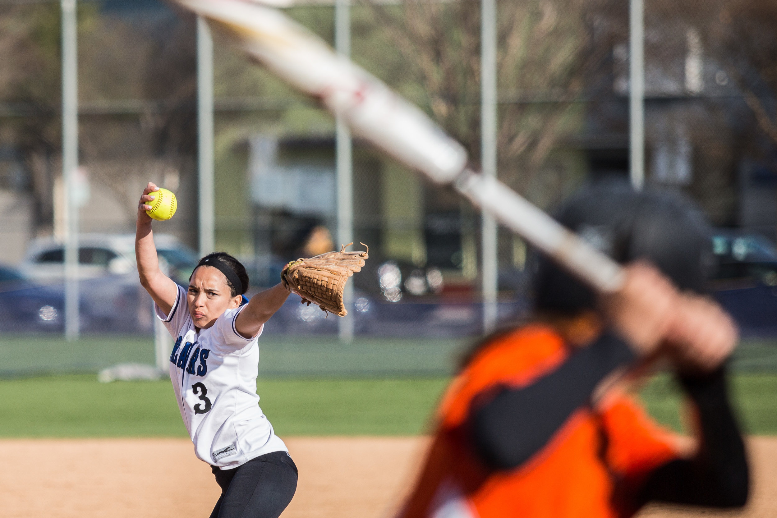  Santa Monica College Corsair freshman in-fielder Ashley Nava (#3, white) pitches a curve ball during the bottom of the third at the Corsair Field in Santa Monica, California, on Tuesday, February 27, 2018. The Corsairs would go on to lose the game 0