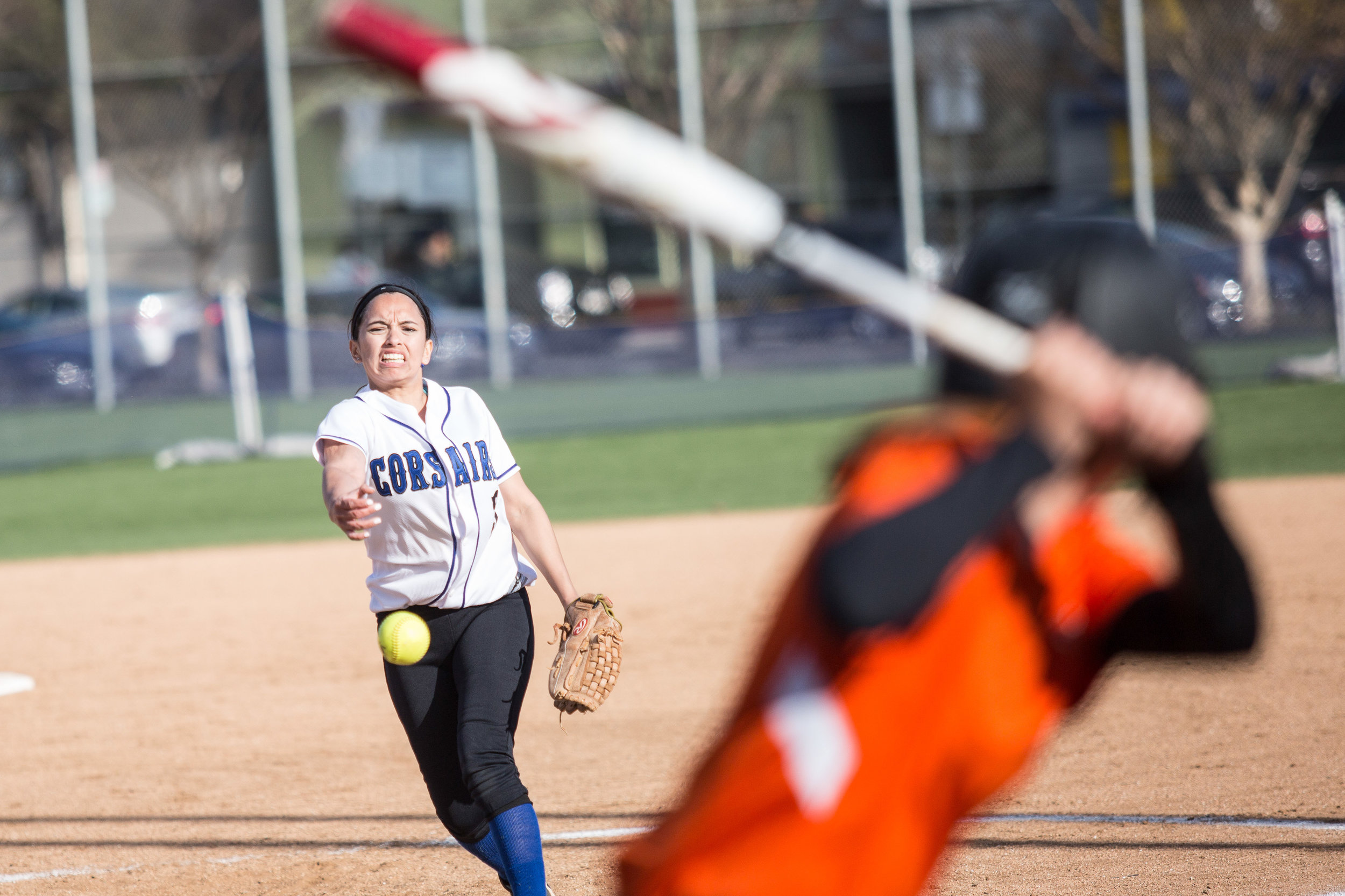  Santa Monica College Corsair freshman in-fielder Ashley Nava (#3, white) pitches a curve ball during the bottom of the third at the Corsair Field in Santa Monica, California, on Tuesday, February 27, 2018. The Corsairs would go on to lose the game 0