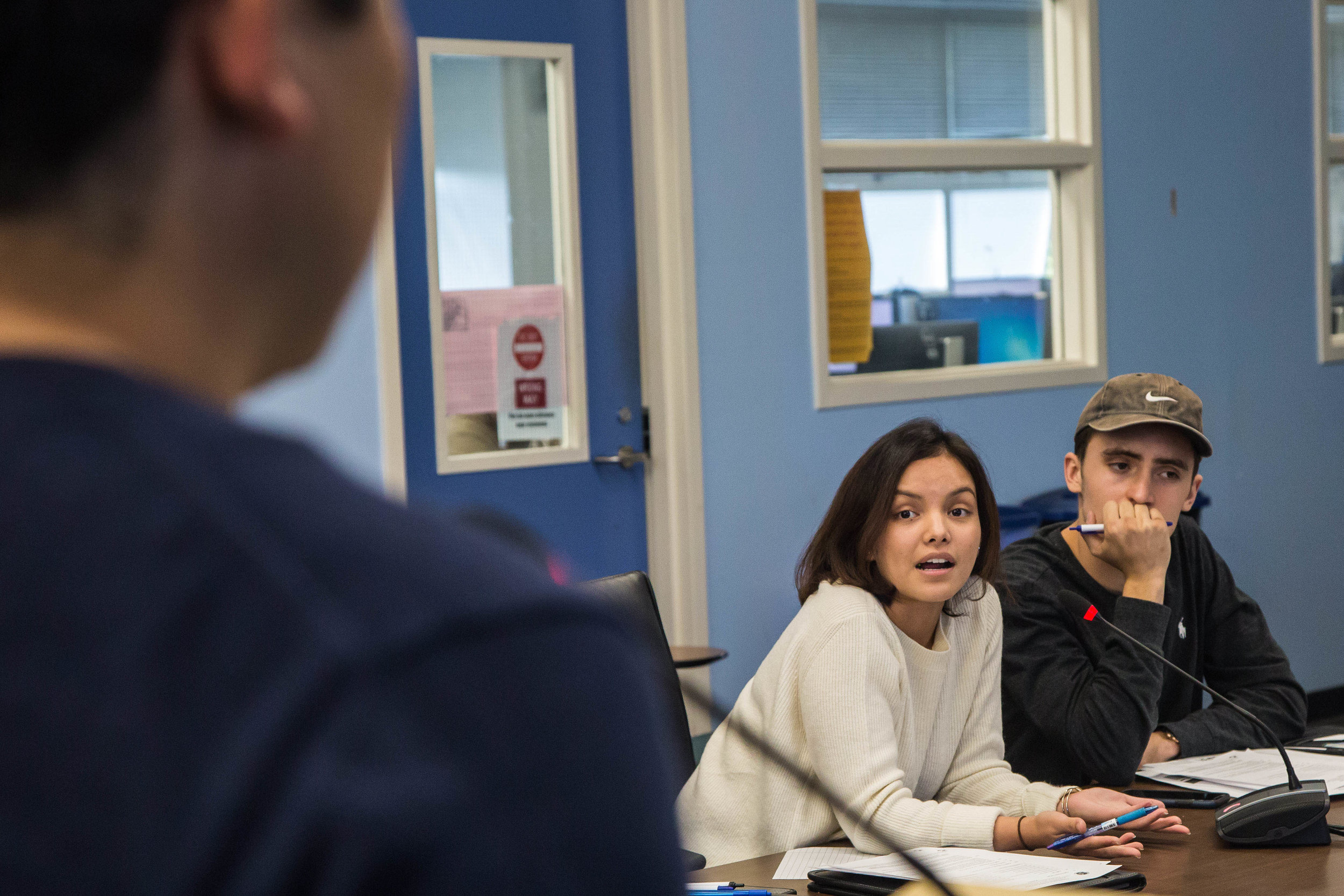  Director of Activities Saori Gurung (center-left), Director of Student Advocacy Santiago Guerrero (center-right) discuss with Santa Monica College Student Edwin Cruz about his proposed Major Action Item 7.2 which would seek approval for funding ($30