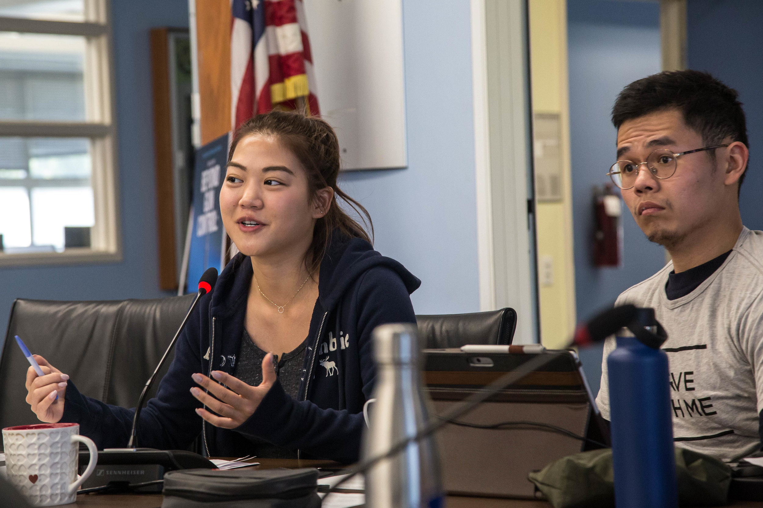  Associated Student President Jennifer Chen (left) and Associate Students Secretary Ryan Ang (right) are found listening while another ordinance is being discussed amongst the A.S Board of Directors during  the Associated Students Board of Directors 