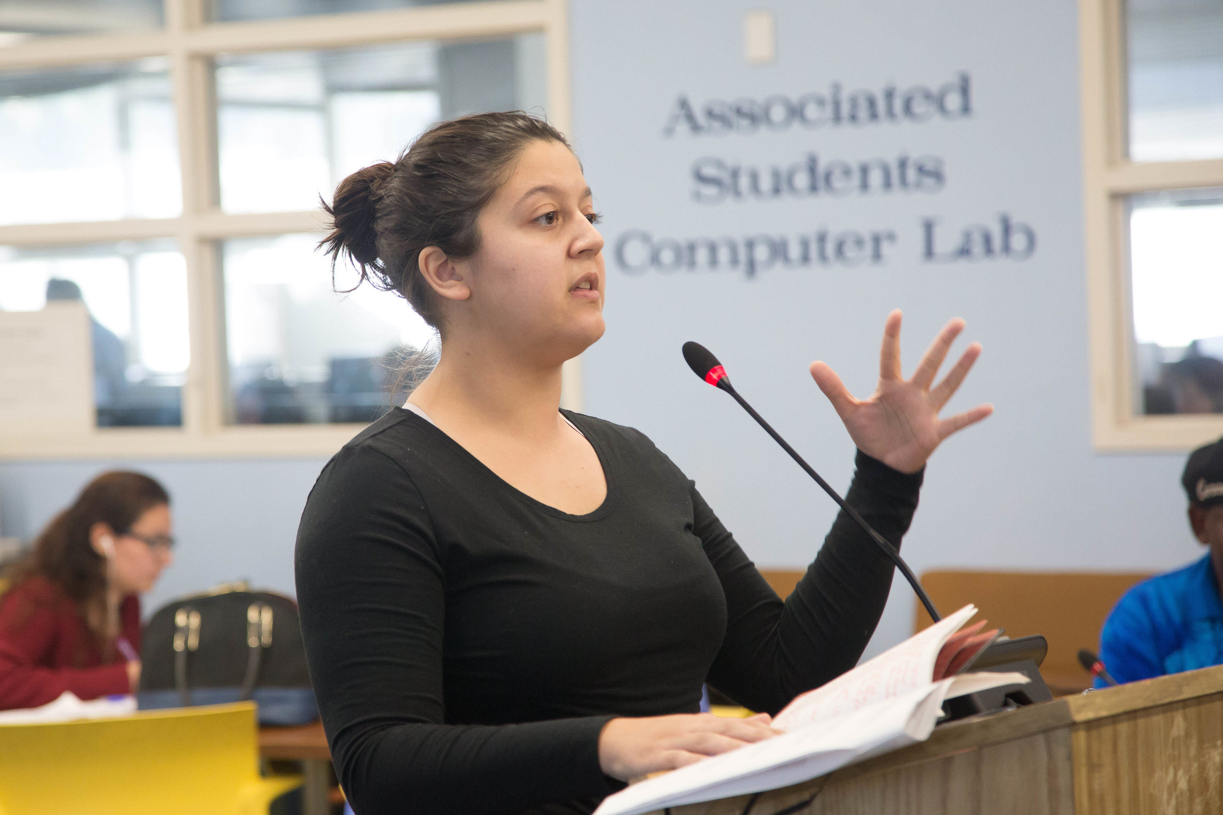  Cassandra Santiago-Amzallag, a student representative for the Bond Oversight Committee, gives a report on current or upcoming construction on or around the Santa Monica College campuses, ensuring that students are aware of all details of such constr