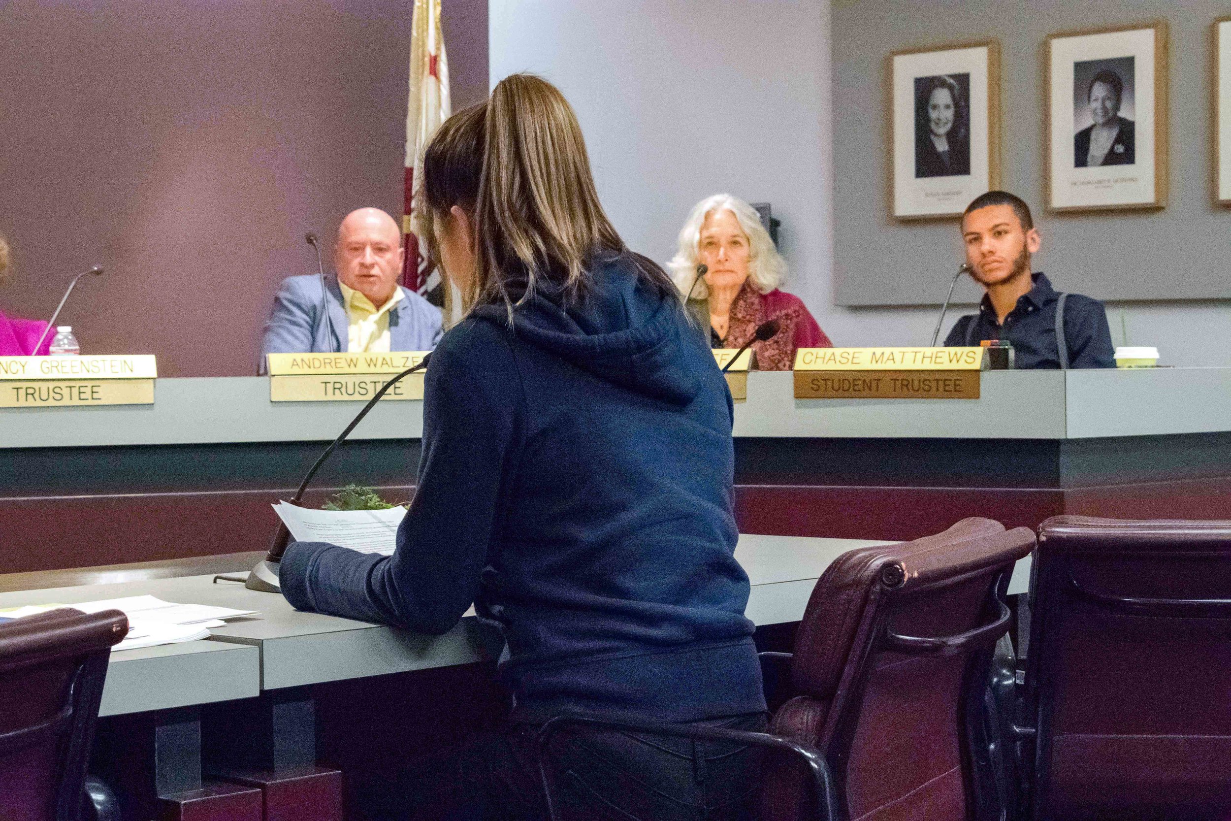  Associated Students President Jennifer Chen talks to the Board of Trustees, partially pictured from left to right are Trustee Dr. Andrew Walzer, Trustee Dr. Susan Aminoff, and Student Trustee Chase Matthews about some recent events happening during 